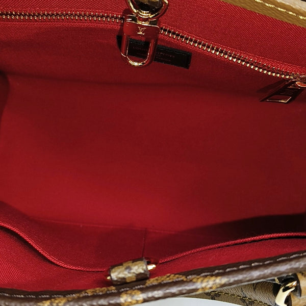 ONTHEGO PM Monogram Coated Canvas Brown