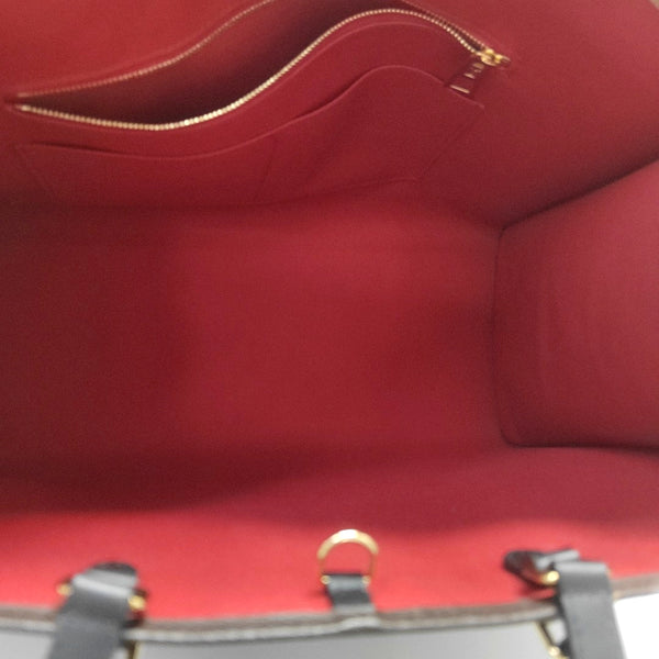 ONTHEGO Monogram Coated Canvas Brown