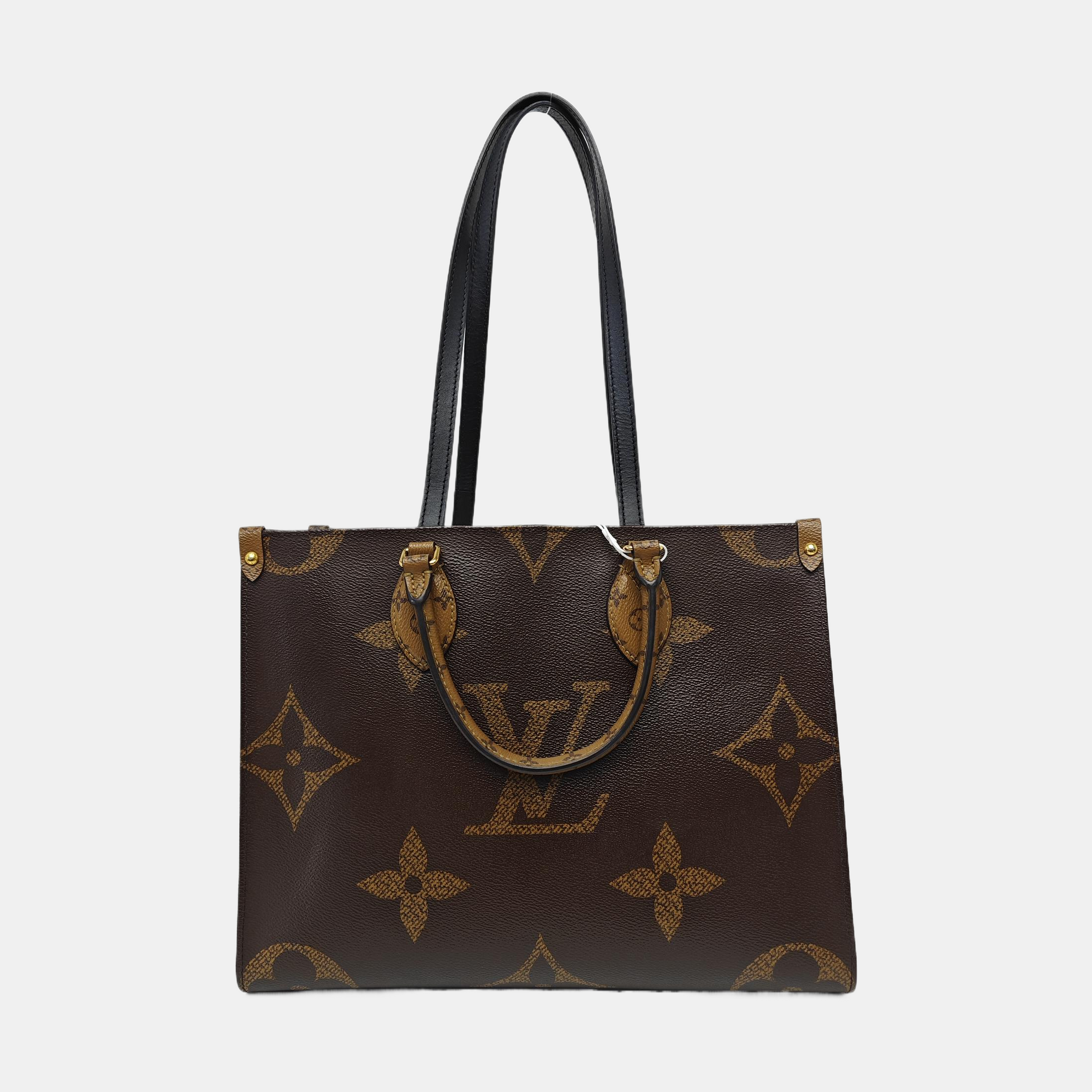 ONTHEGO MM Monogram Coated Canvas Brown