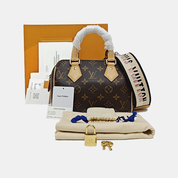 SPEEDY 20 Monogram Coated Canvas Brown