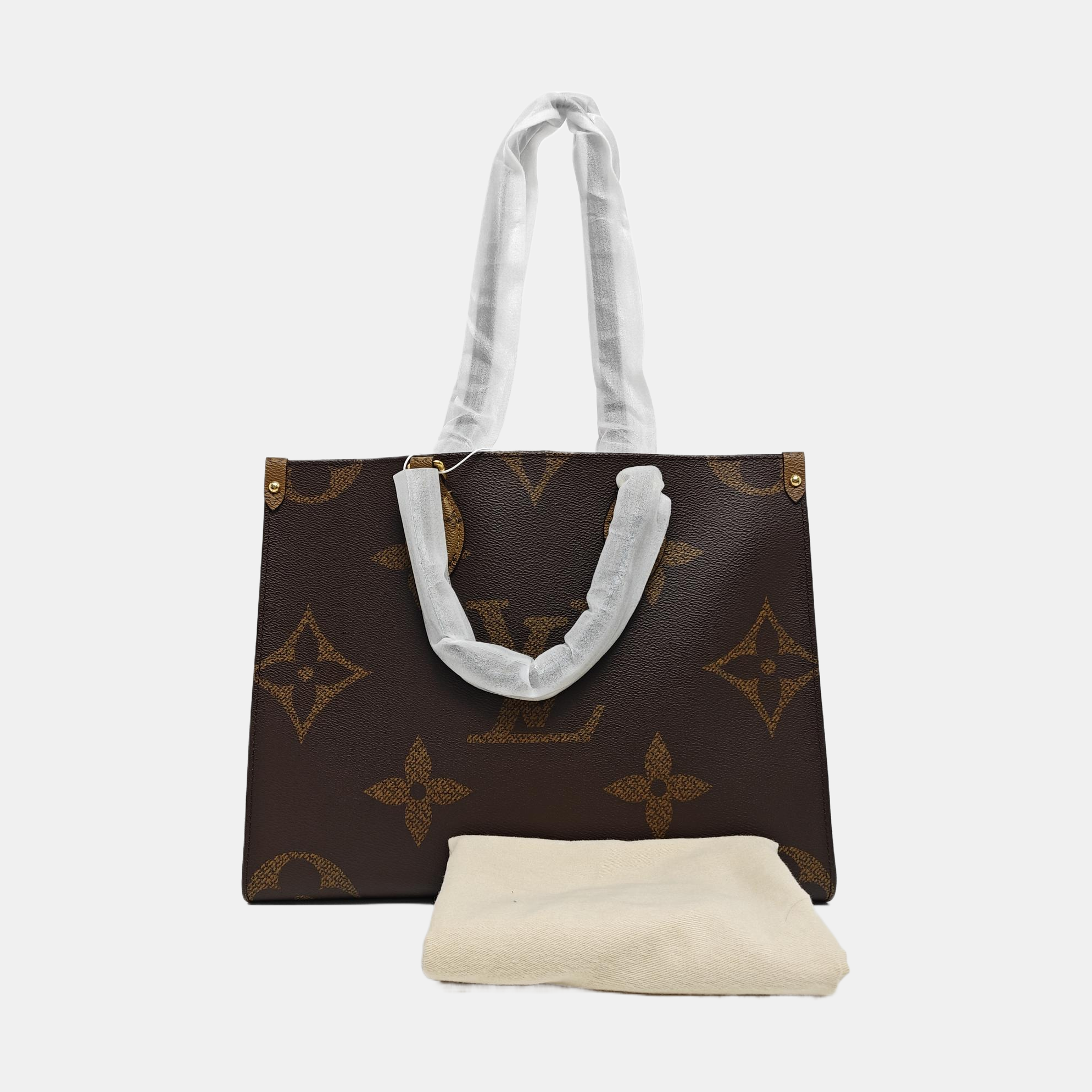 ONTHEGO MM Monogram Coated Canvas Brown