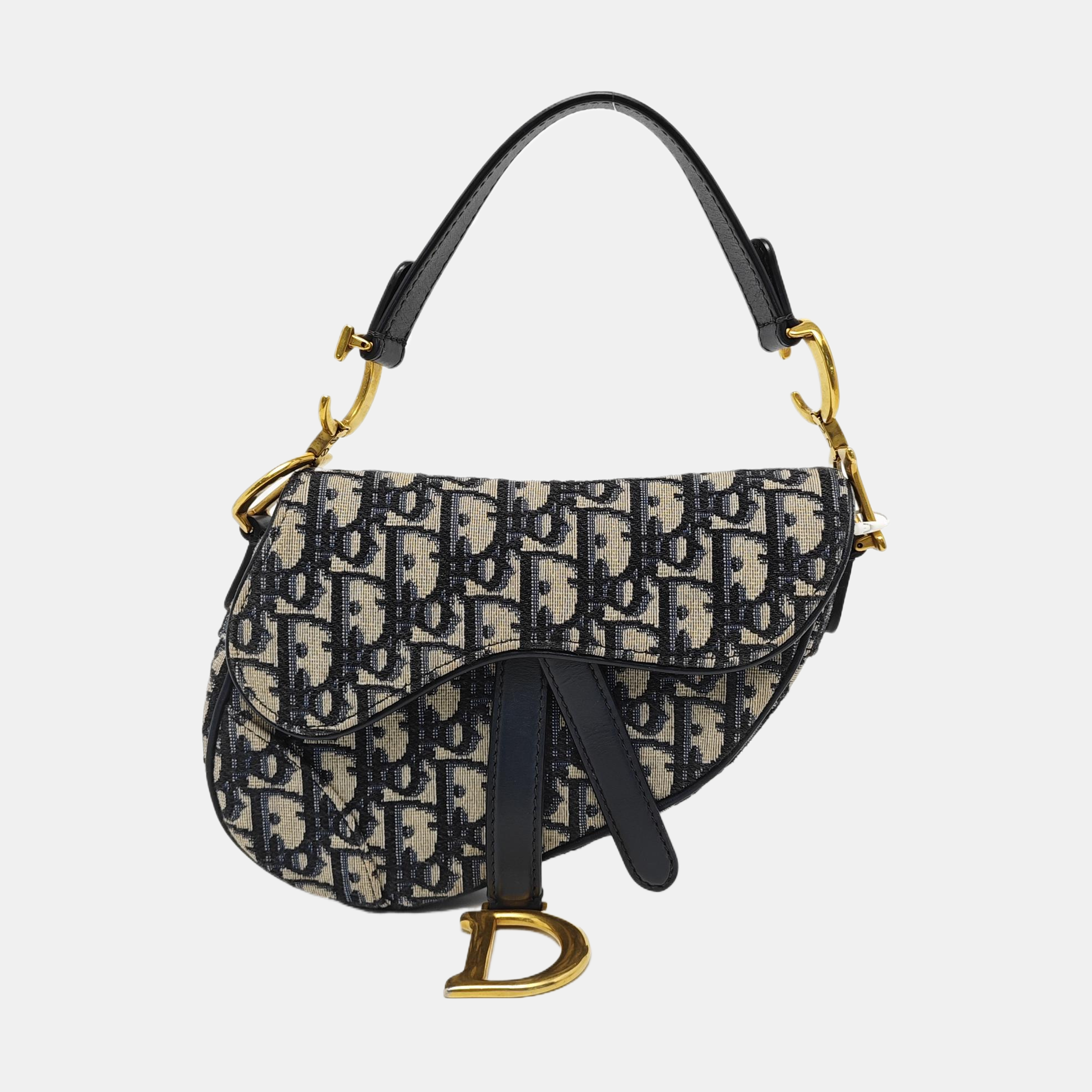 Authenticated pre-owned  Saddle Mini Monogram Canvas Blue - Top Handle Bag at Looply