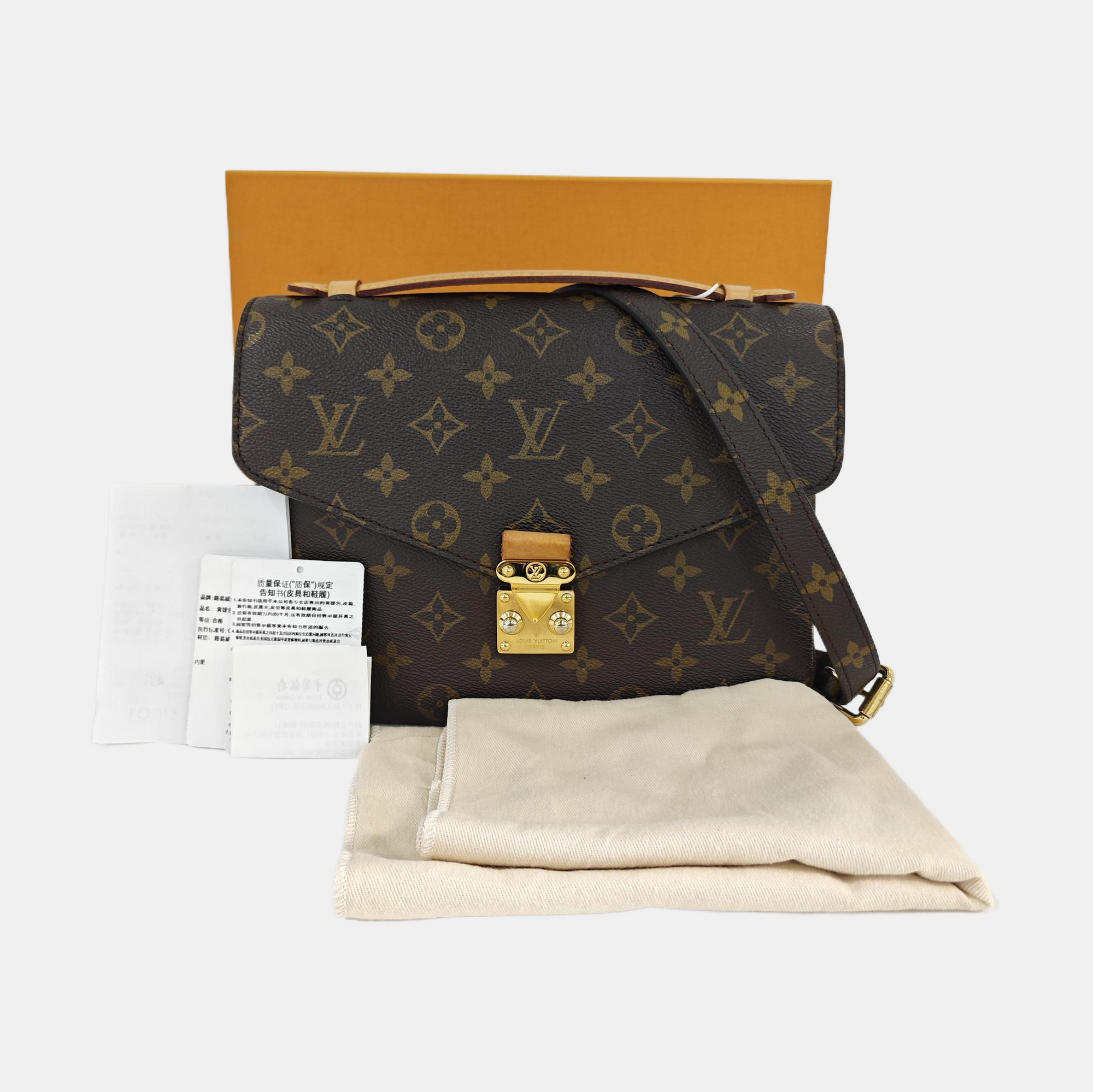 MÉTIS MM Monogram Coated Canvas Brown