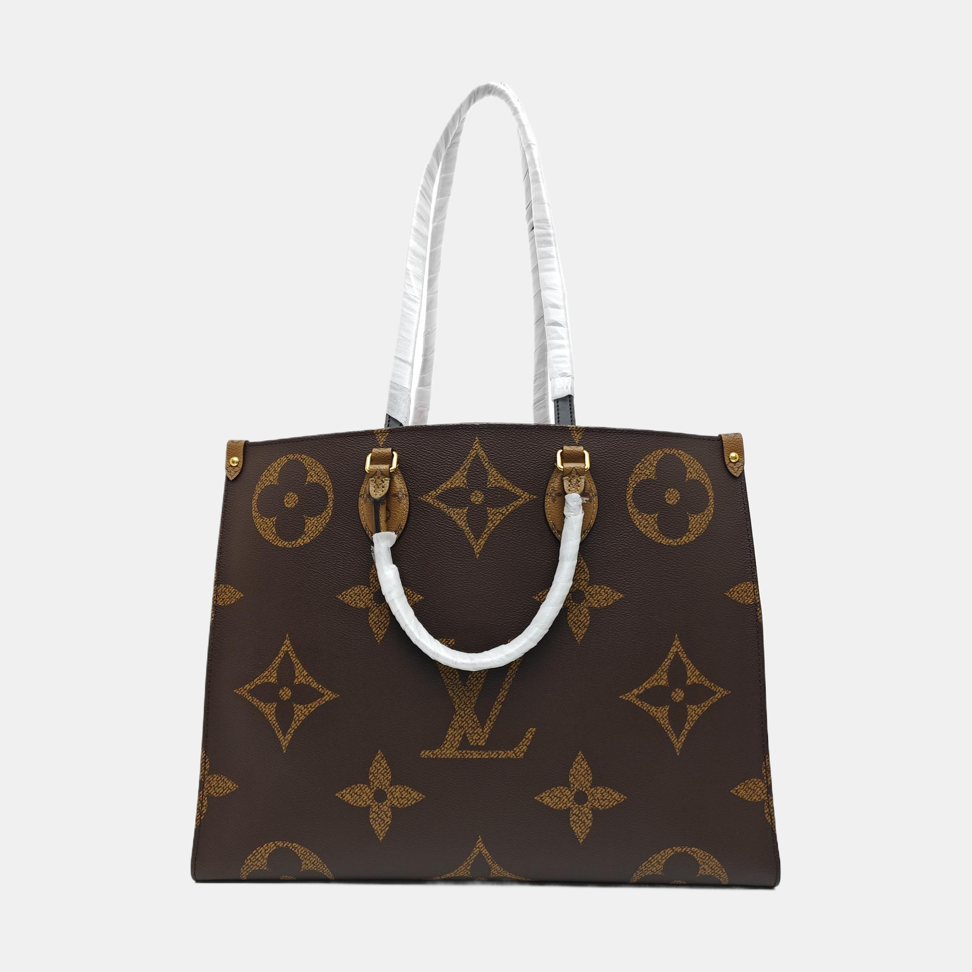 ONTHEGO GM Monogram Coated Canvas Brown