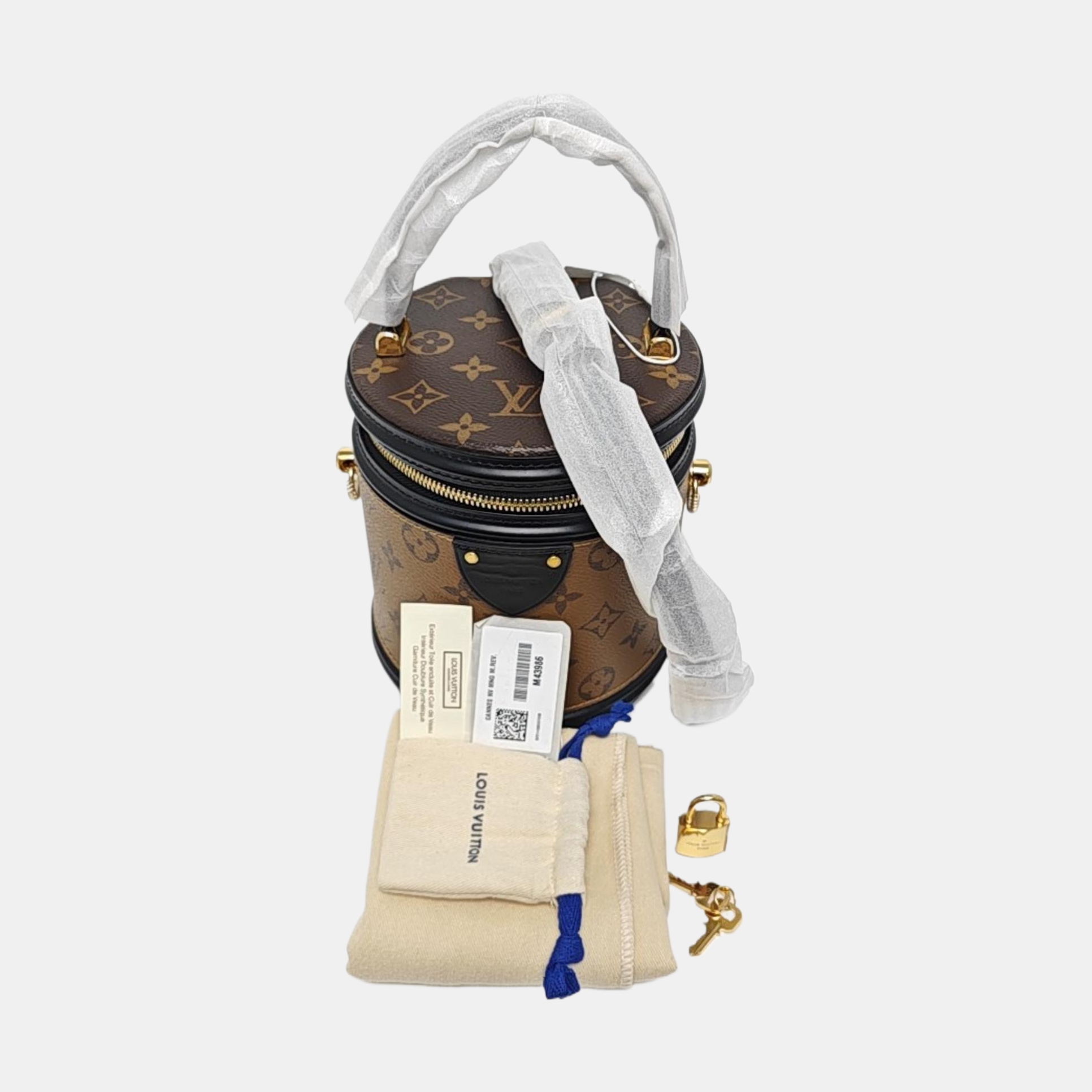 CANNES PM Monogram Coated Canvas Brown