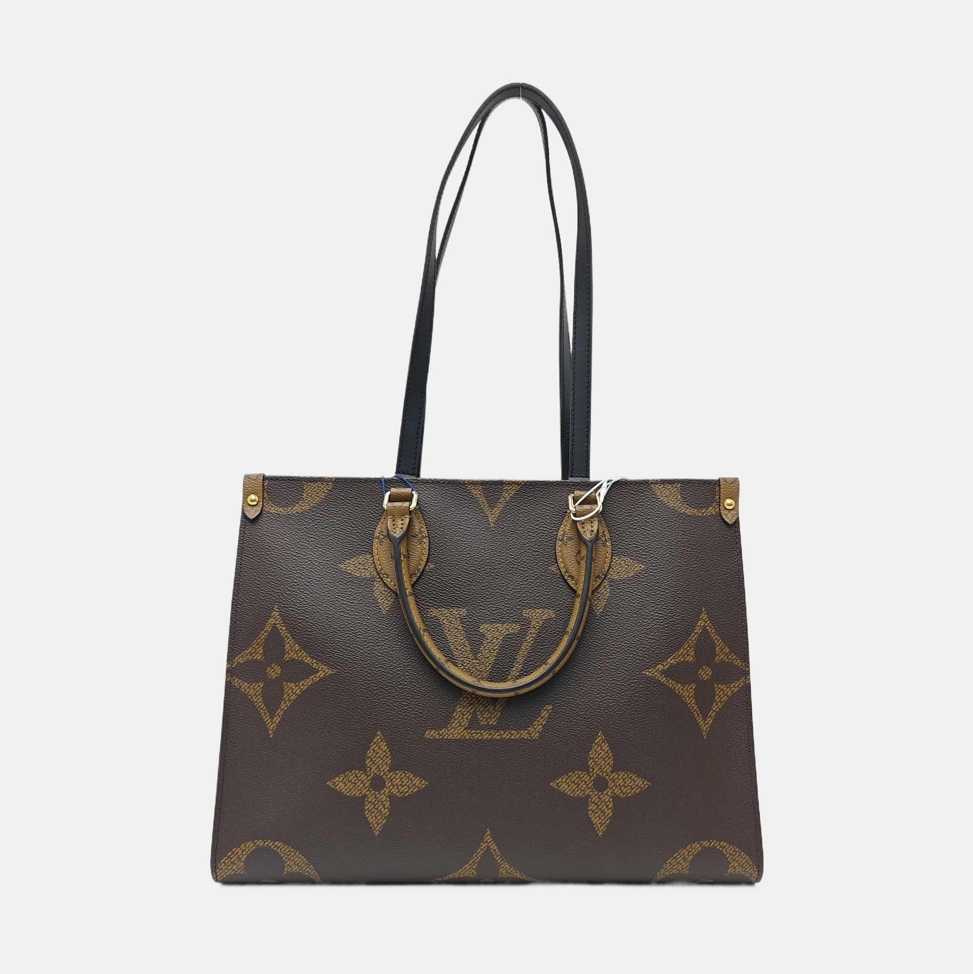 ONTHEGO MM Monogram Coated Canvas Brown