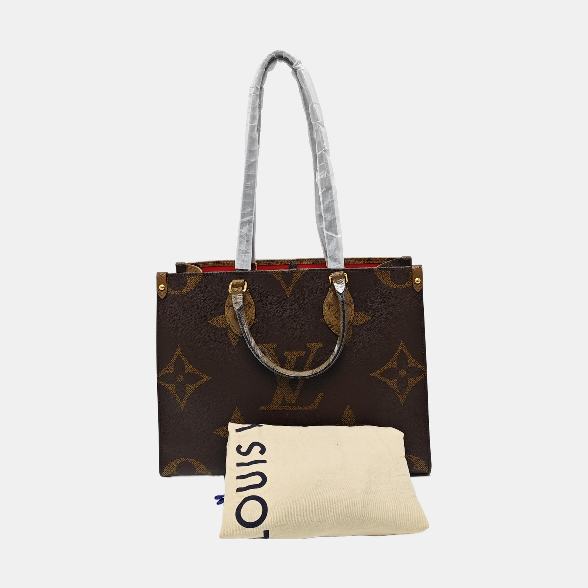ONTHEGO MM Monogram Coated Canvas Brown