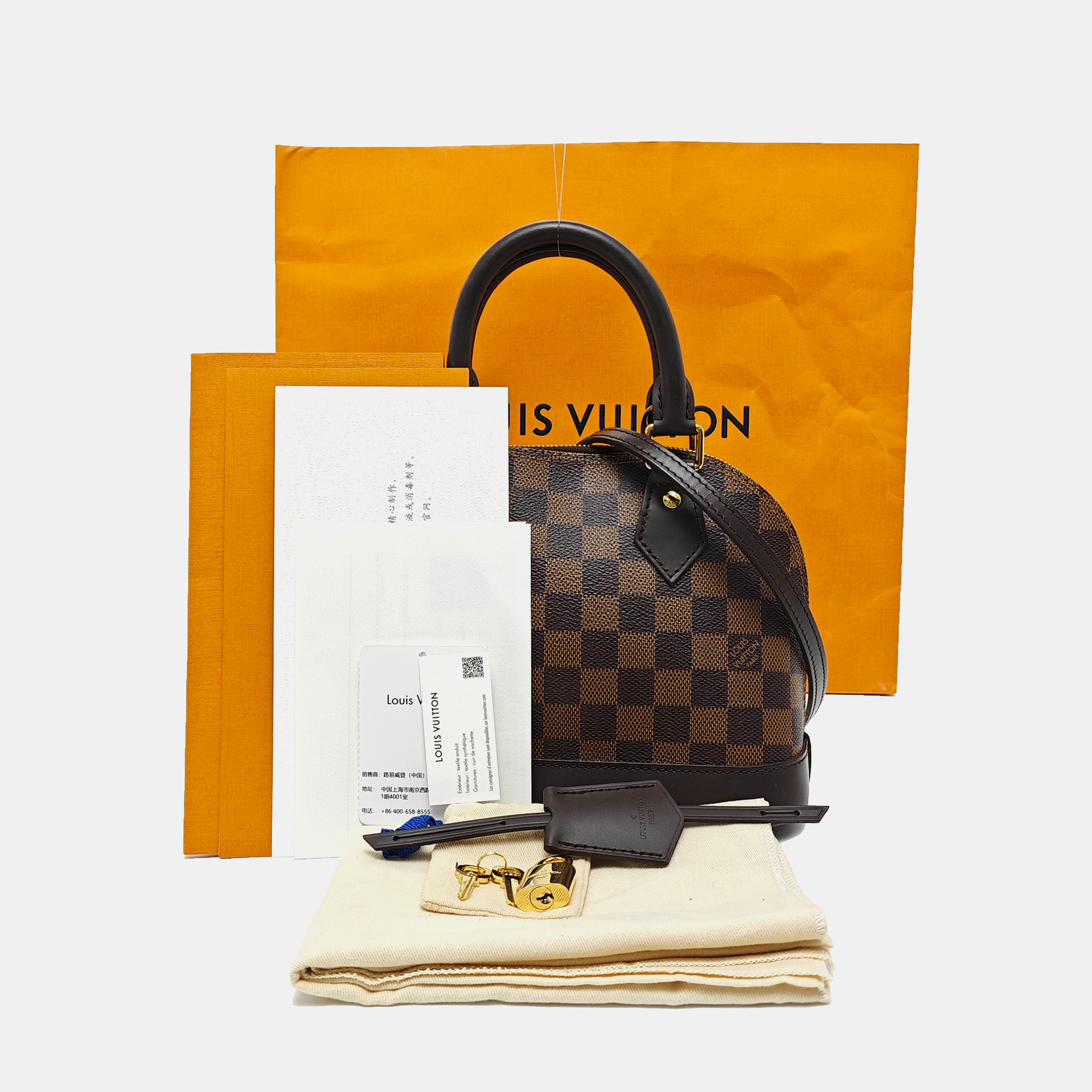 ALMA BB Damier Ebene Coated Canvas Brown
