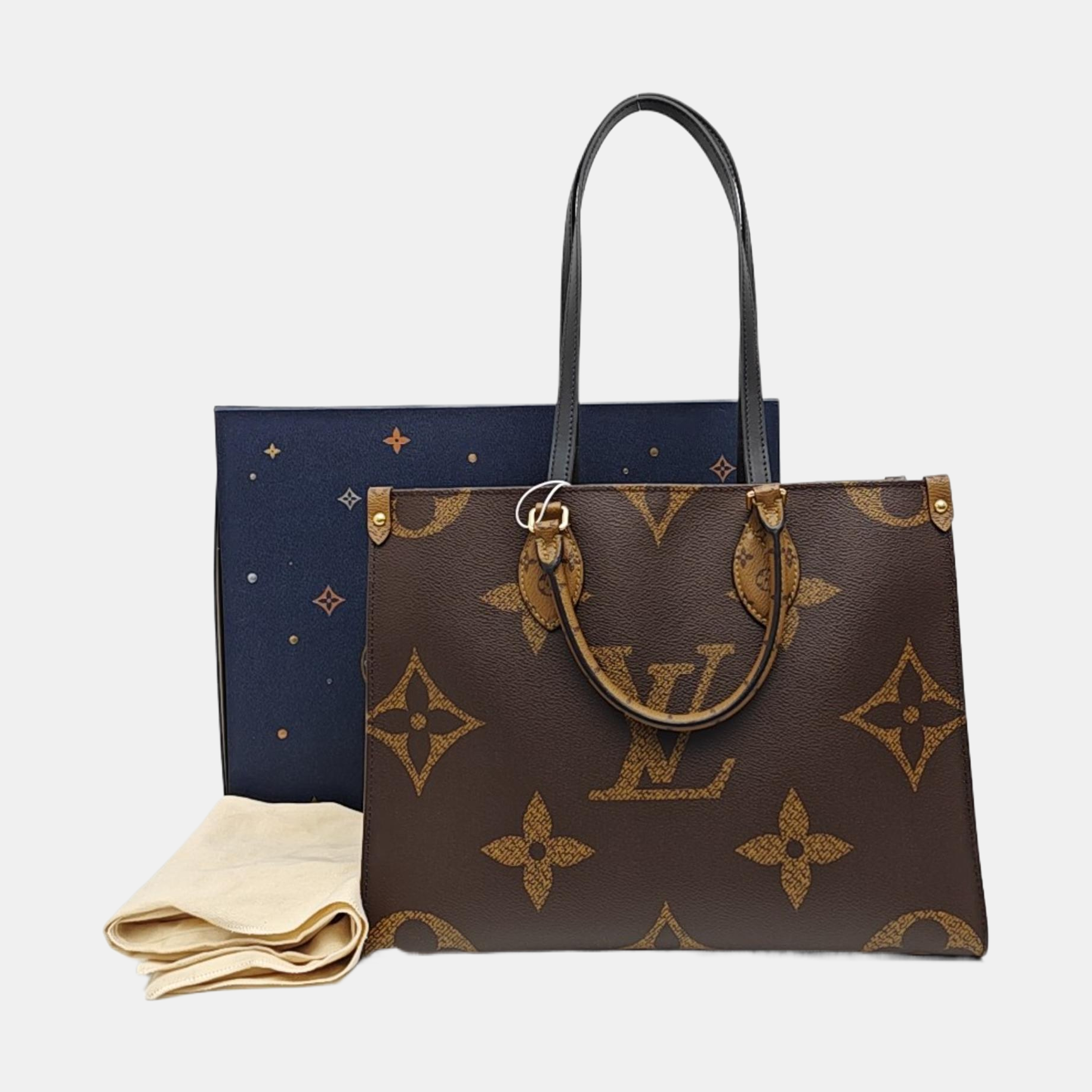 ONTHEGO MM Monogram Coated Canvas Brown