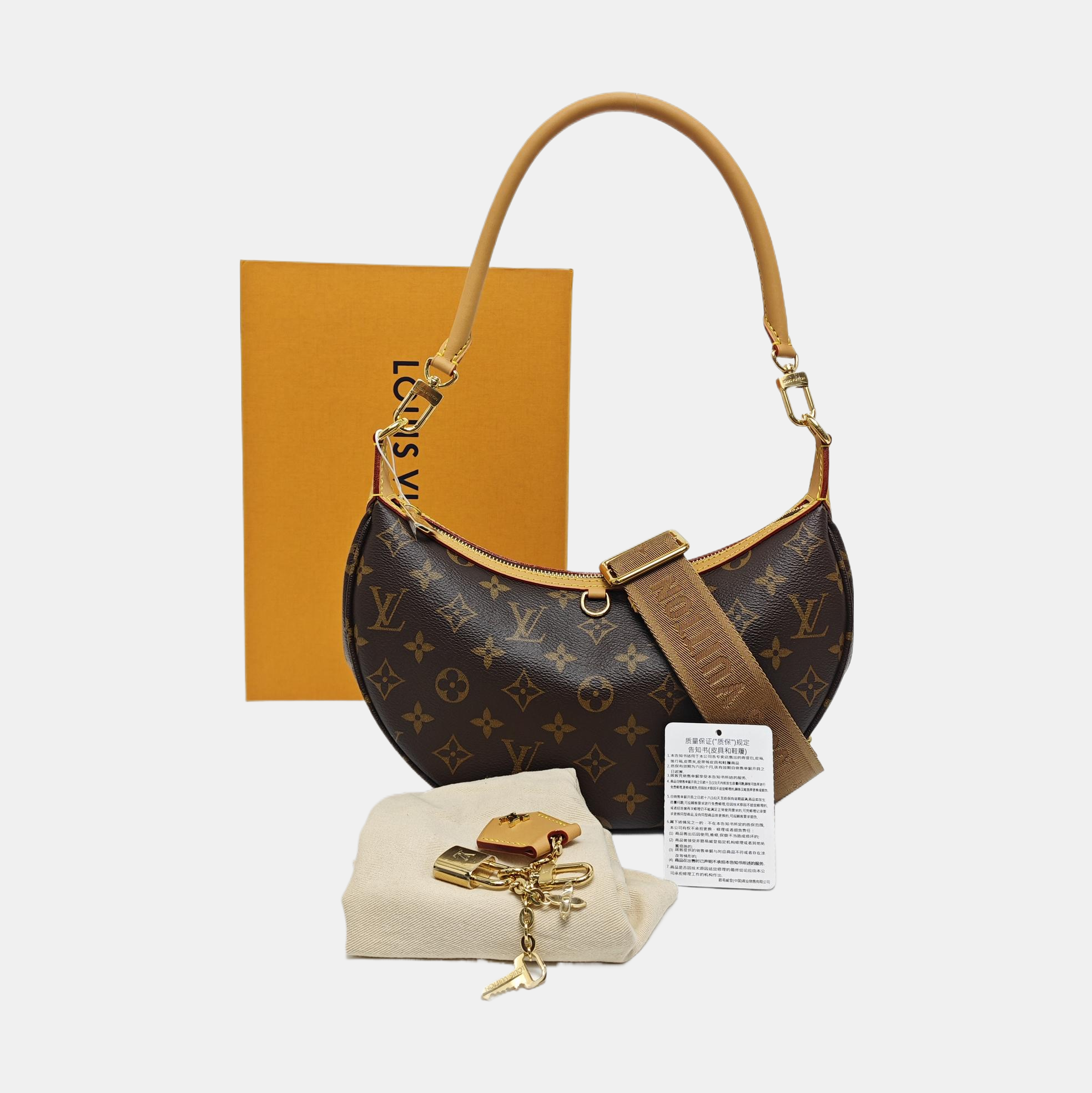 LOOPING Monogram Coated Canvas Brown