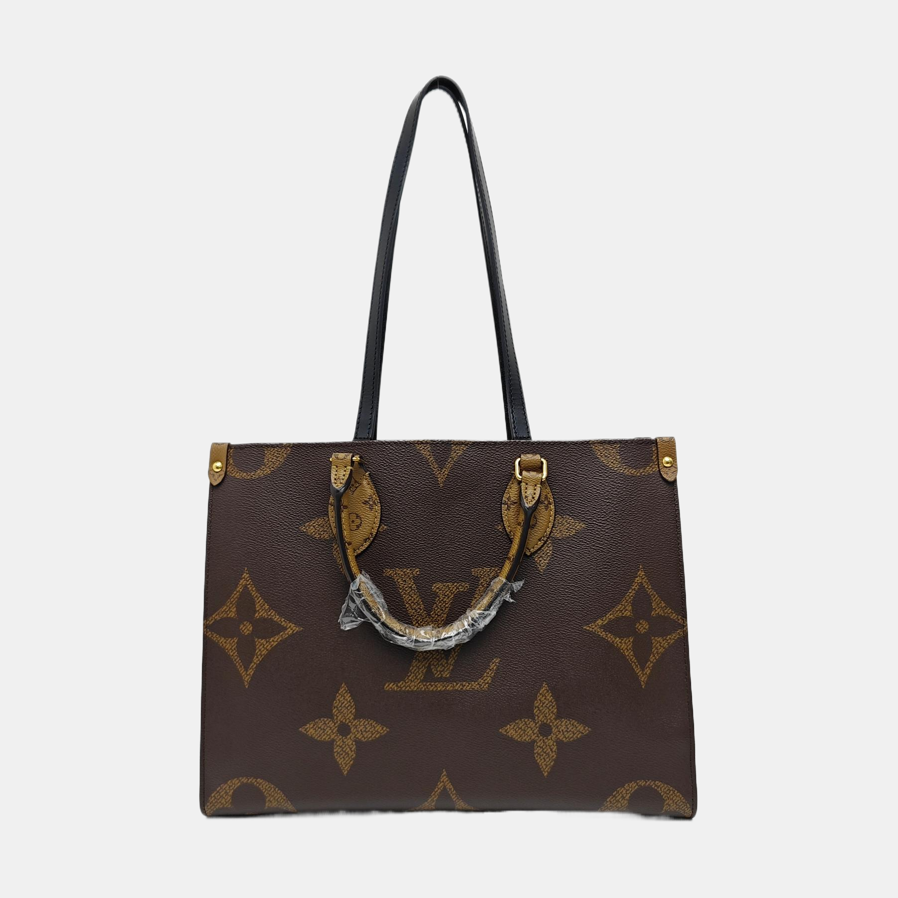 ONTHEGO MM Monogram Coated Canvas Brown