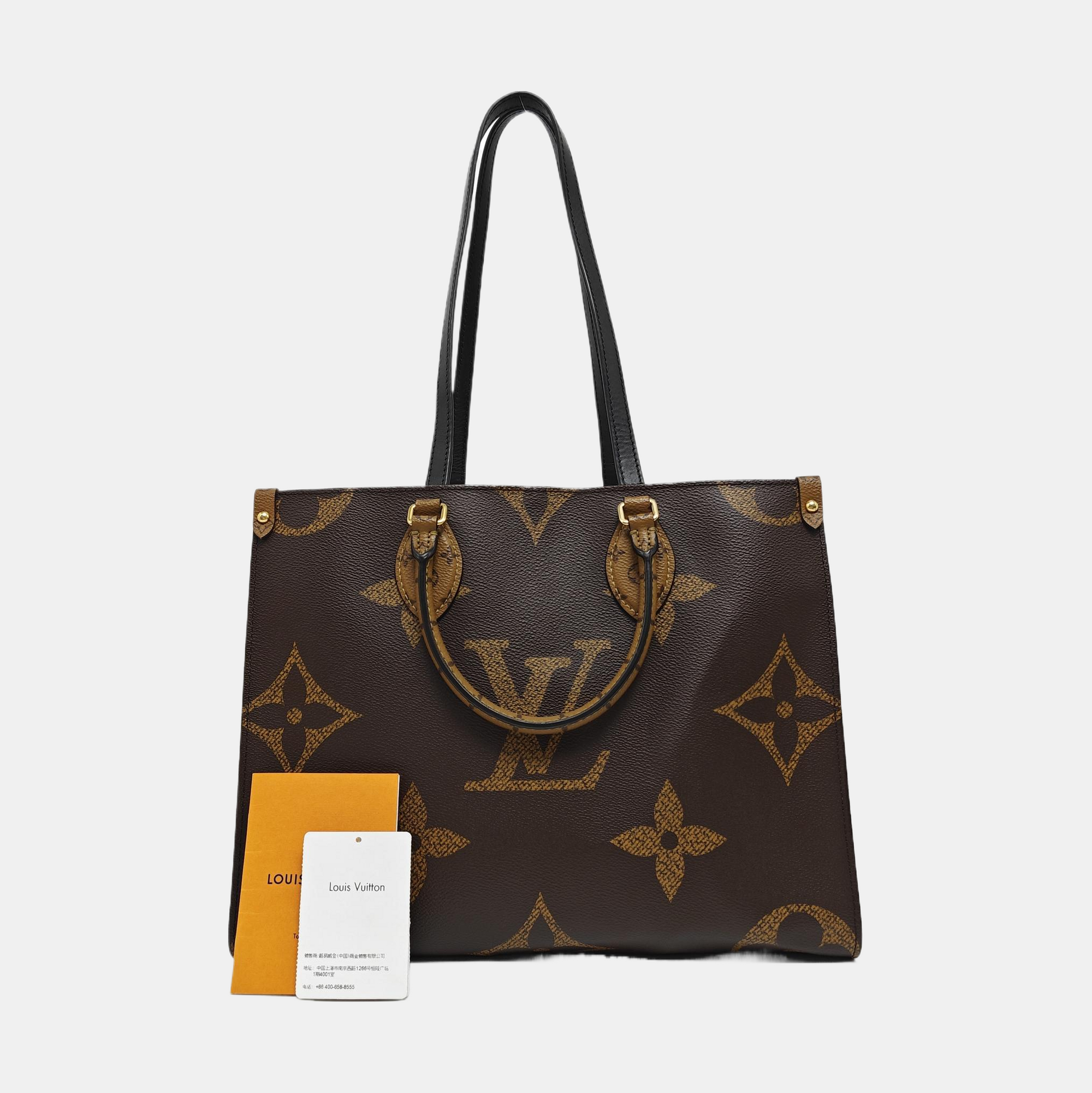 ONTHEGO MM Monogram Coated Canvas Brown