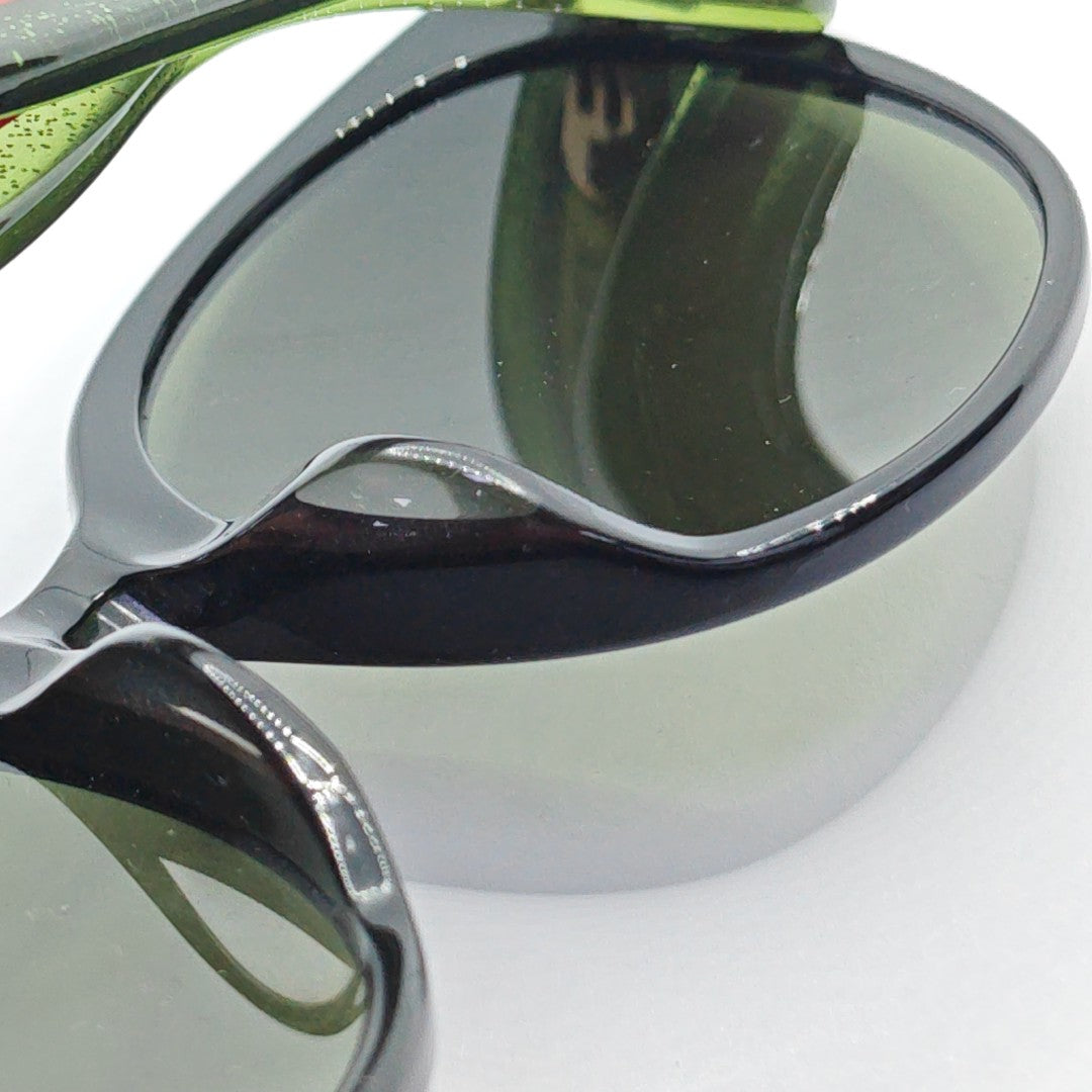 Gafas de sol sintéticas verdes