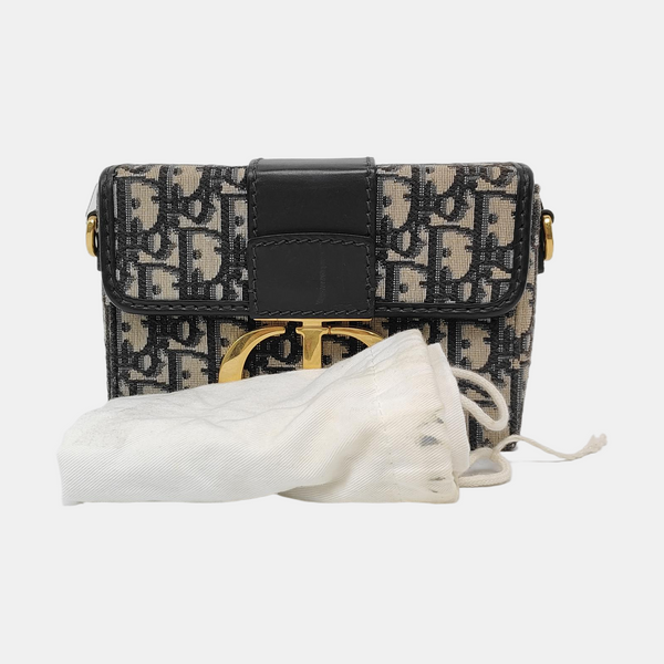 Authenticated pre-owned  30 Montaigne Oblique Canvas Blue - Clutch at Looply