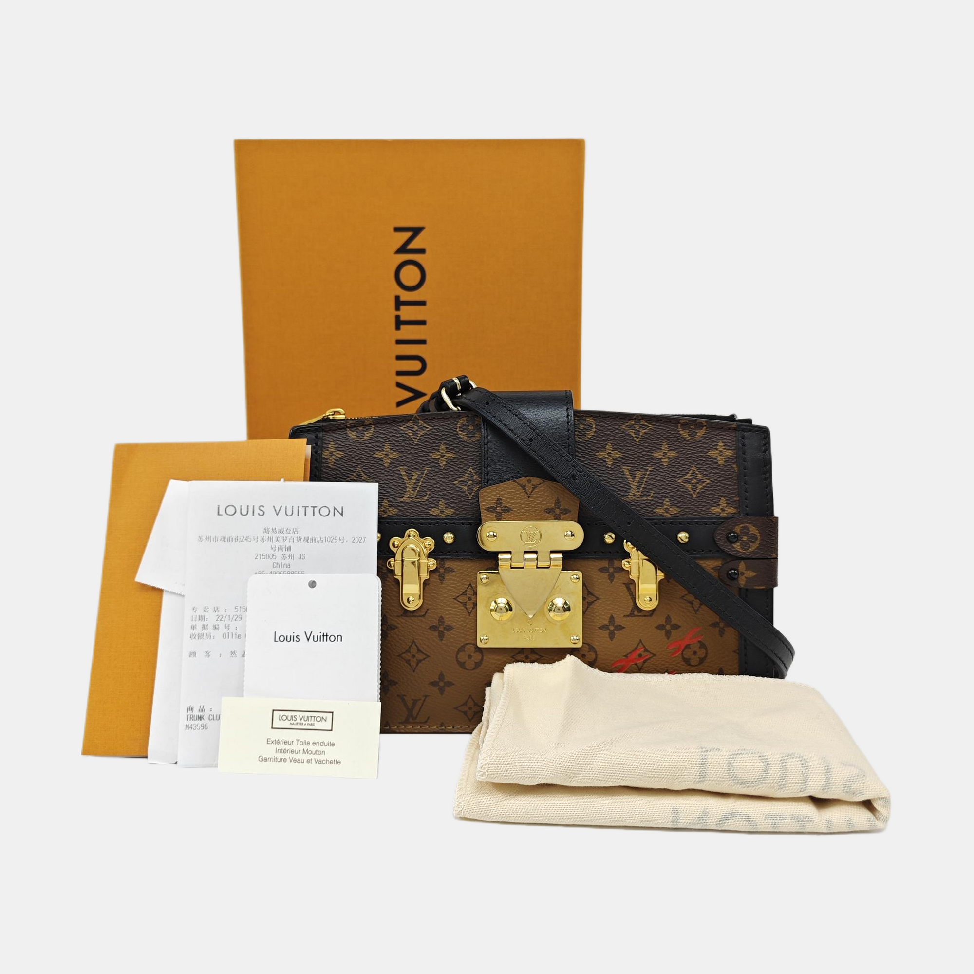 TRUNK Monogram Coated Canvas Brown