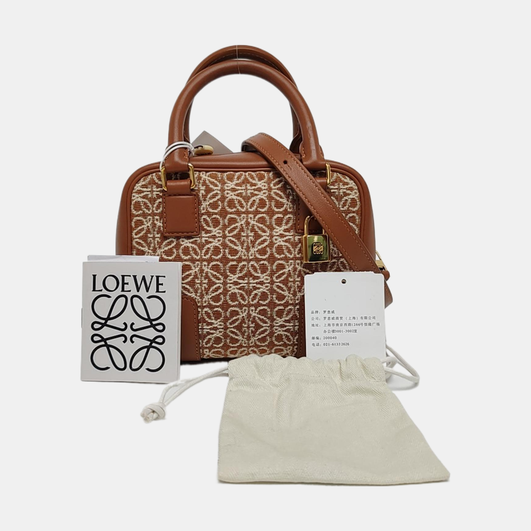 Authenticated pre-owned  Amazona Mini Fabric Brown - Shoulder Bag at Looply