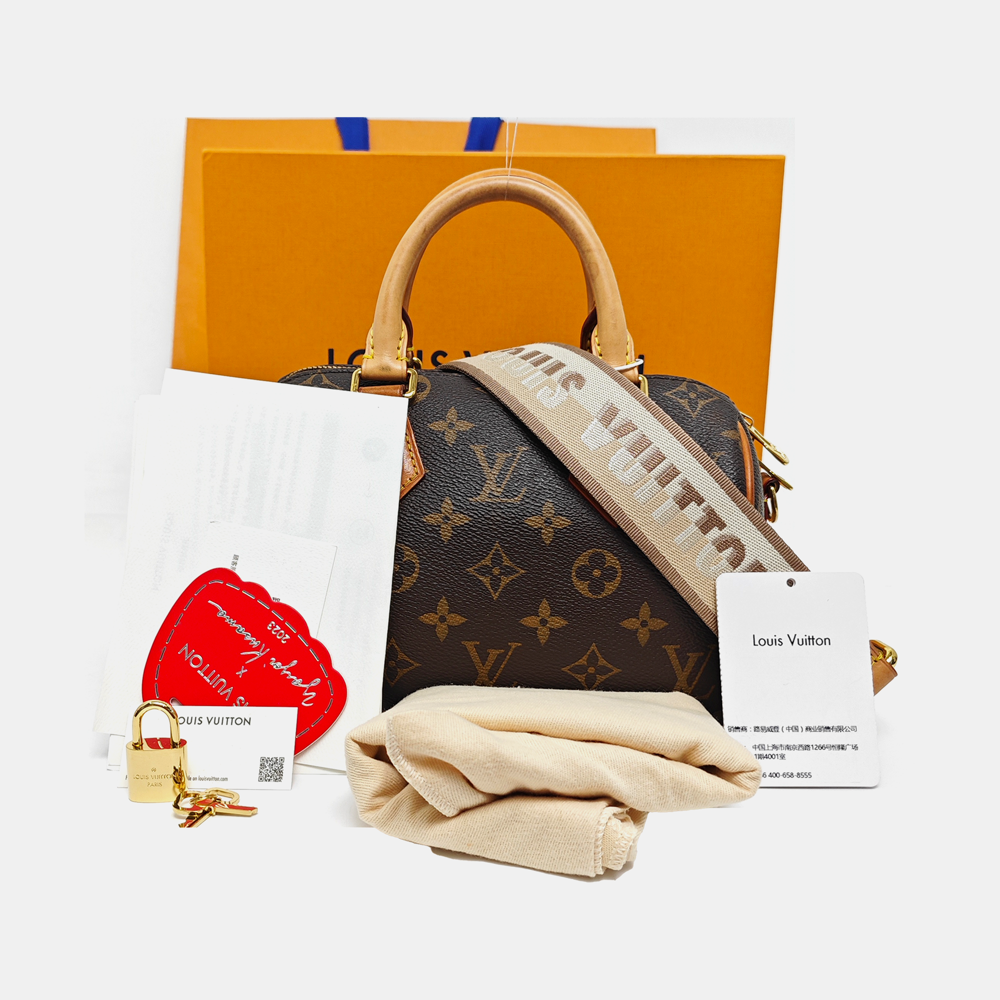 SPEEDY 20 Monogram Coated Canvas Brown