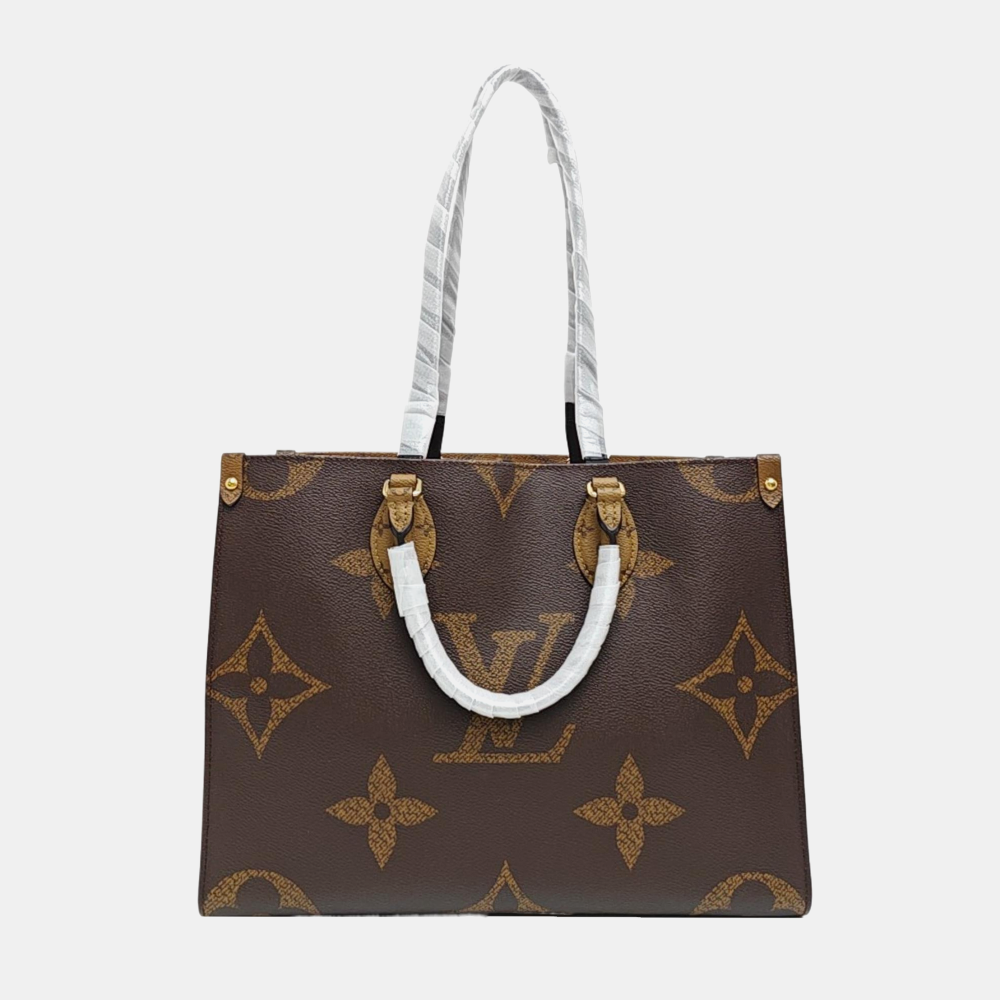 ONTHEGO MM Monogram Coated Canvas Brown