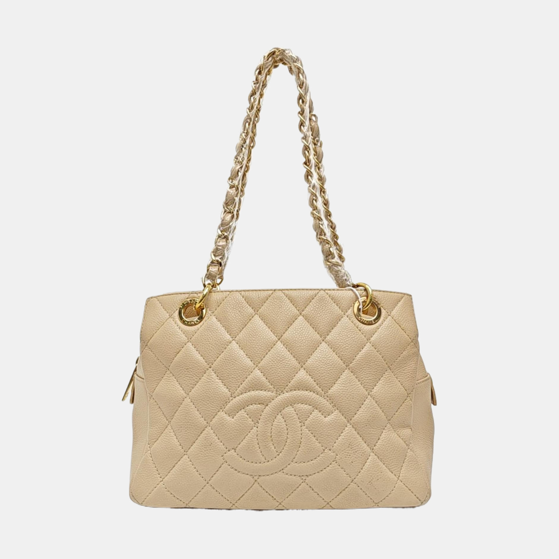CHANEL PETITE Piel de becerro graneada acolchada beige