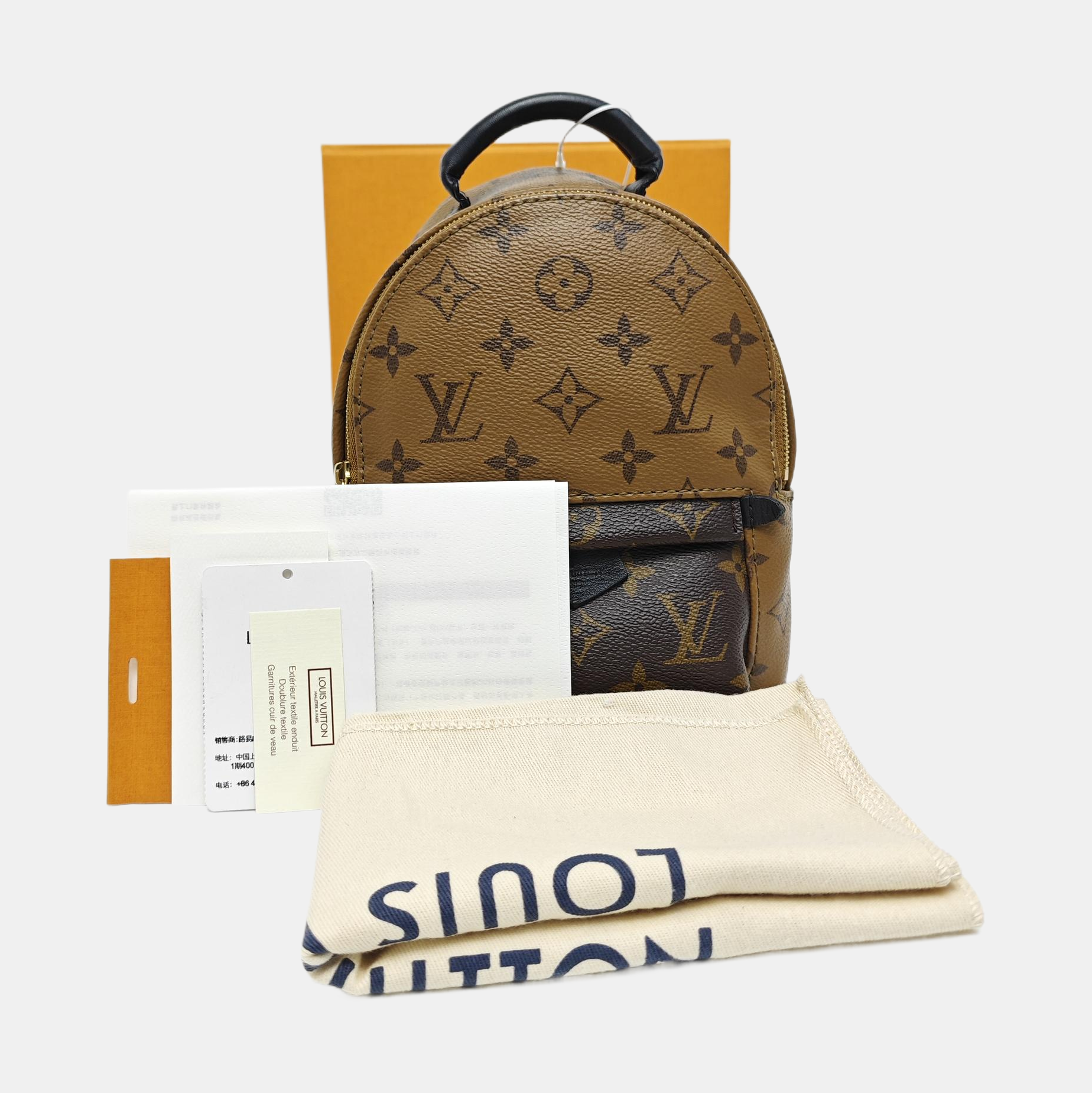 PALM SPRINGS Mini Monogram Coated Canvas Brown