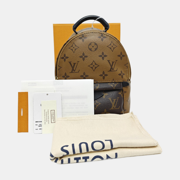 PALM SPRINGS Mini Monogram Coated Canvas Brown