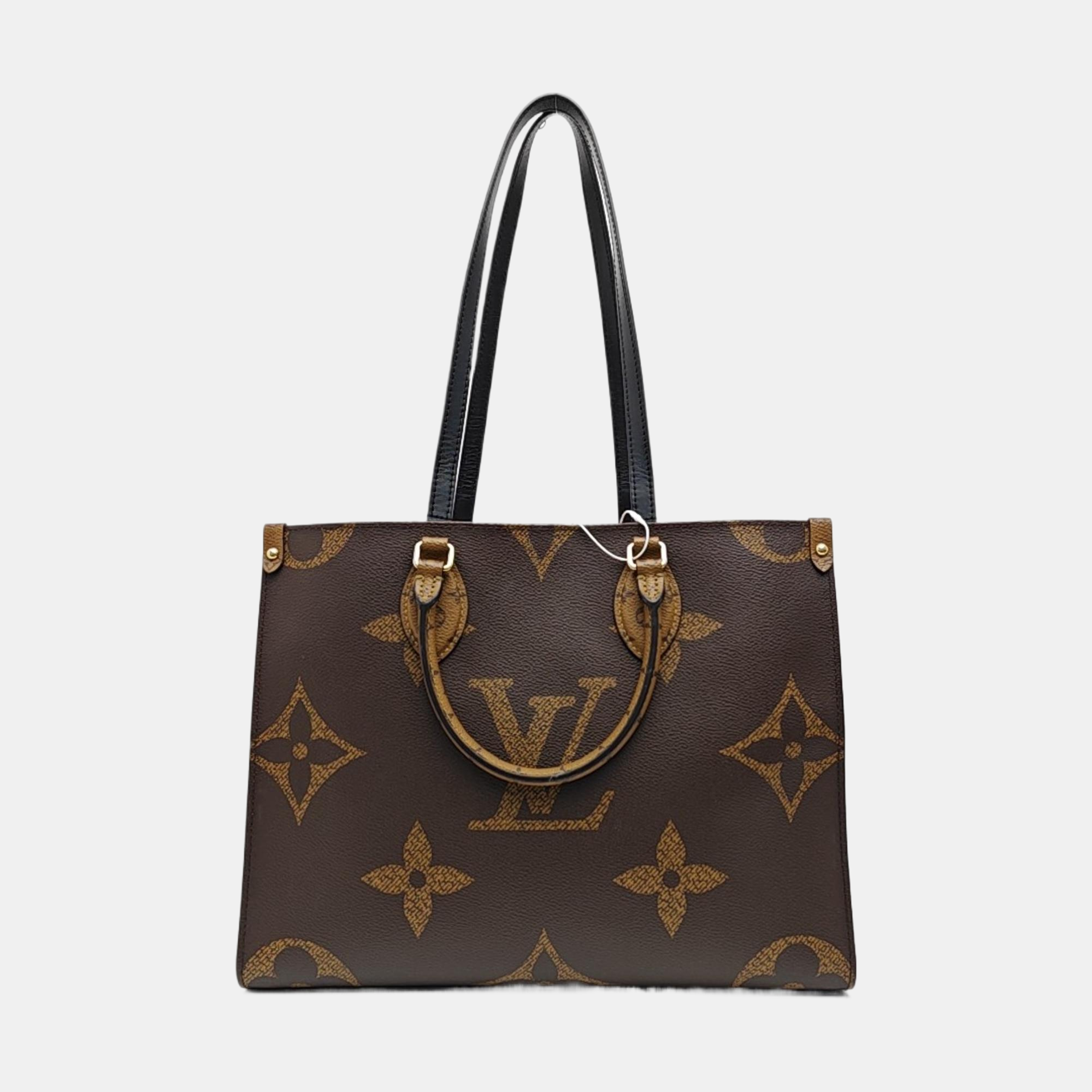 ONTHEGO MM Monogram Coated Canvas Brown