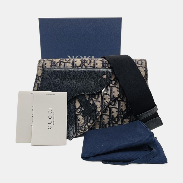 Authenticated pre-owned  Saddle Monogram Canvas Blue - Shoulder Bag at Looply