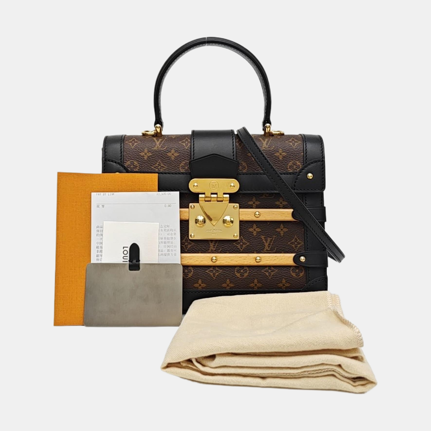 TRIANON PM Monogram Coated Canvas Brown