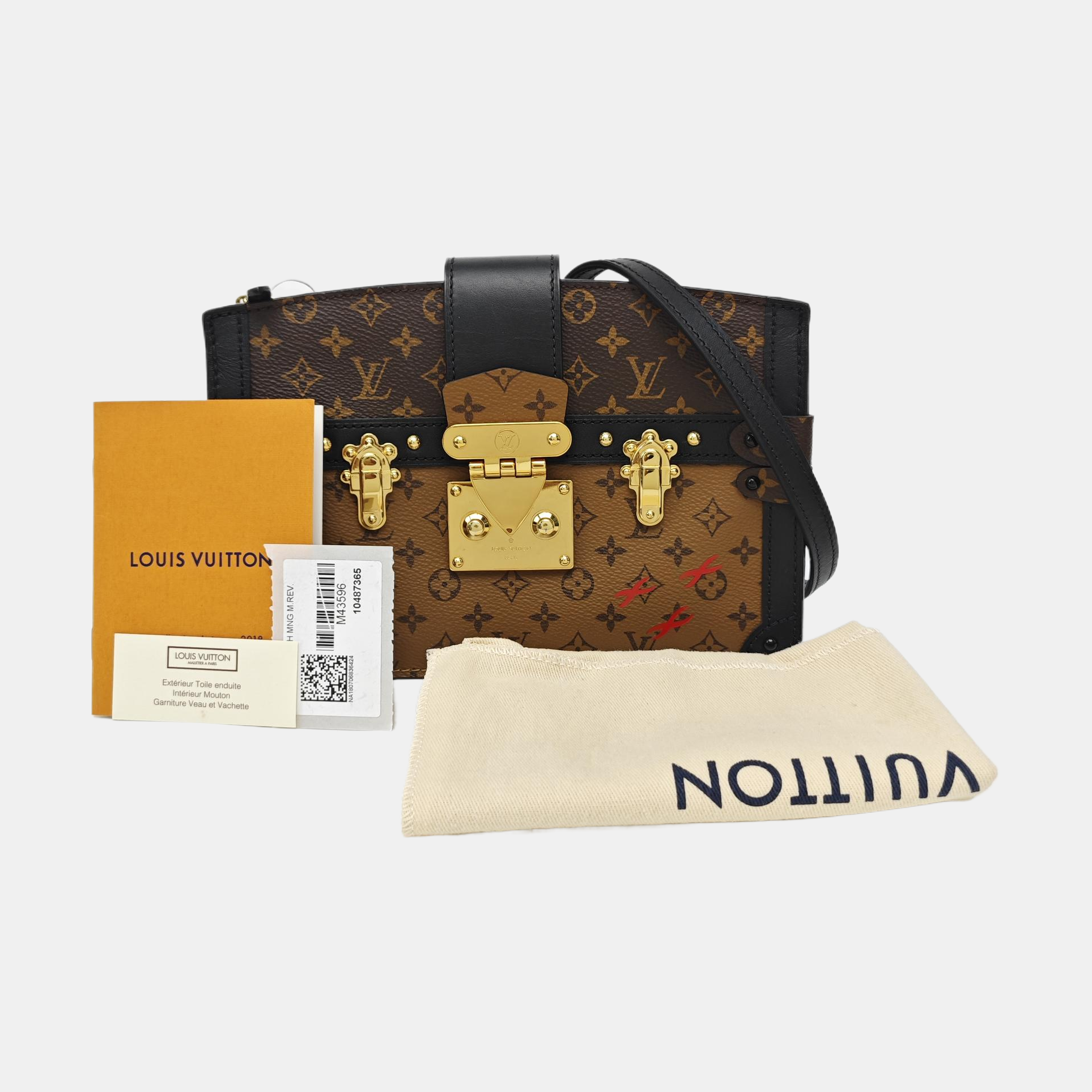 TRUNK Monogram Coated Canvas Brown