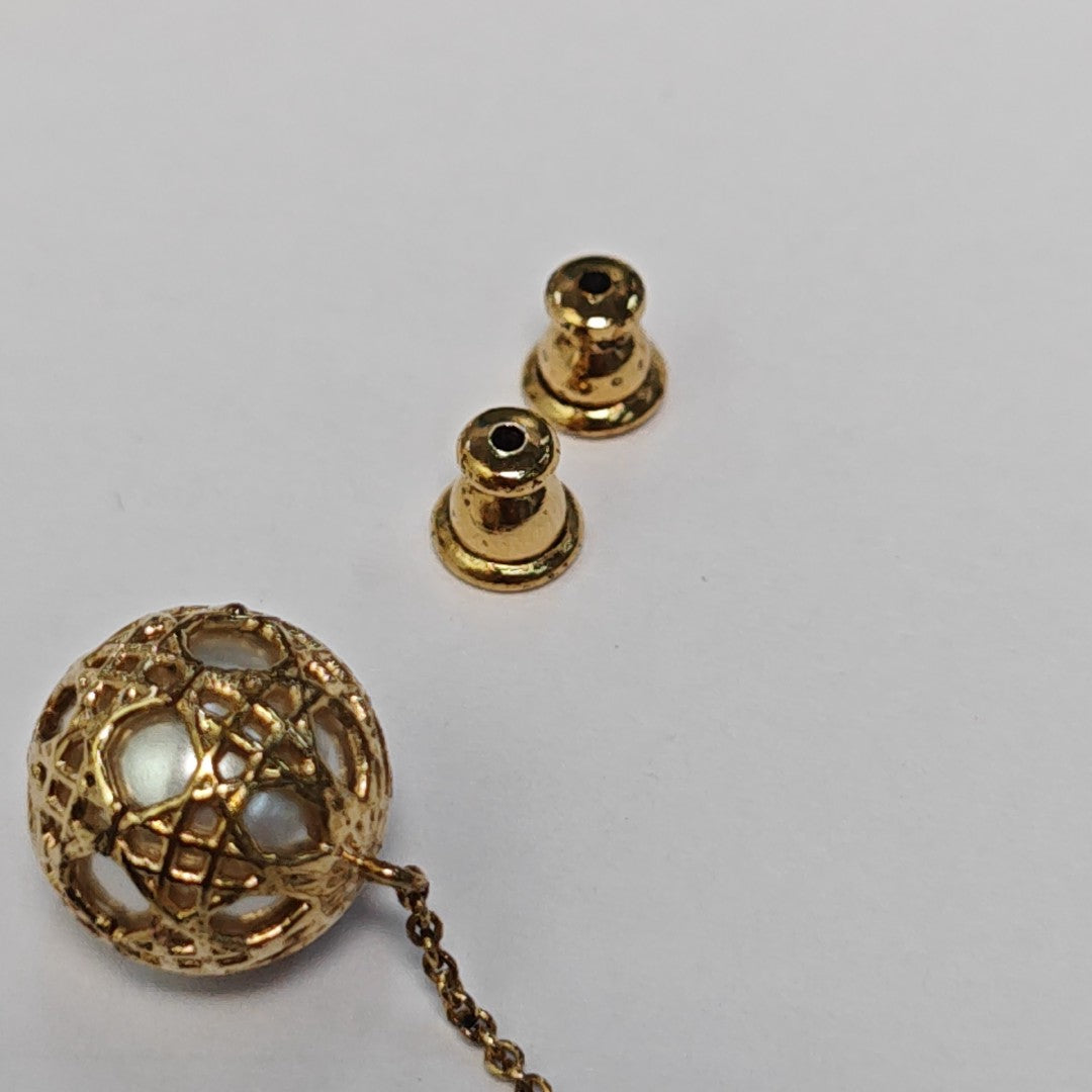 Pendientes Secret Cannage de metal dorado