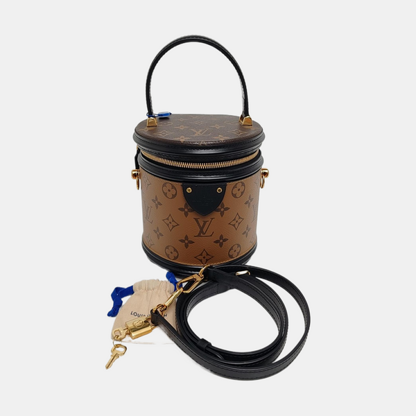 CANNES PM Monogram Coated Canvas Brown