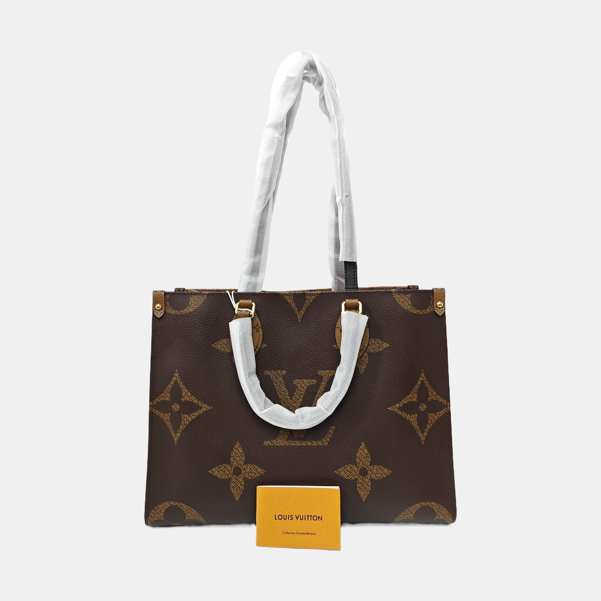ONTHEGO MM Monogram Coated Canvas Brown