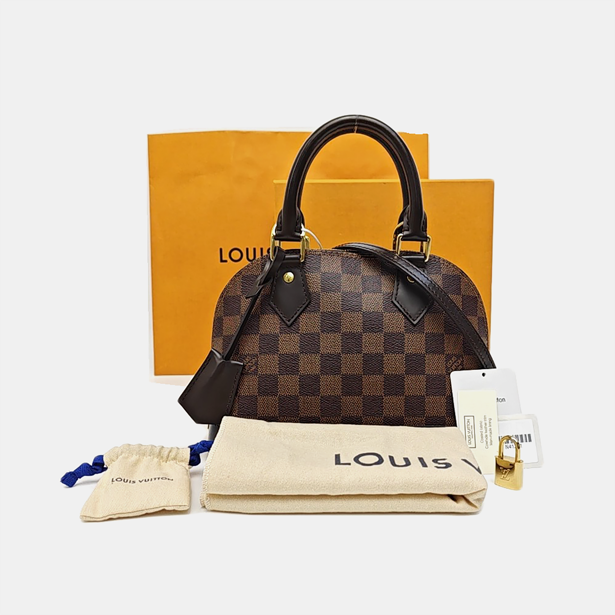 ALMA BB Damier Ebene Coated Canvas Brown