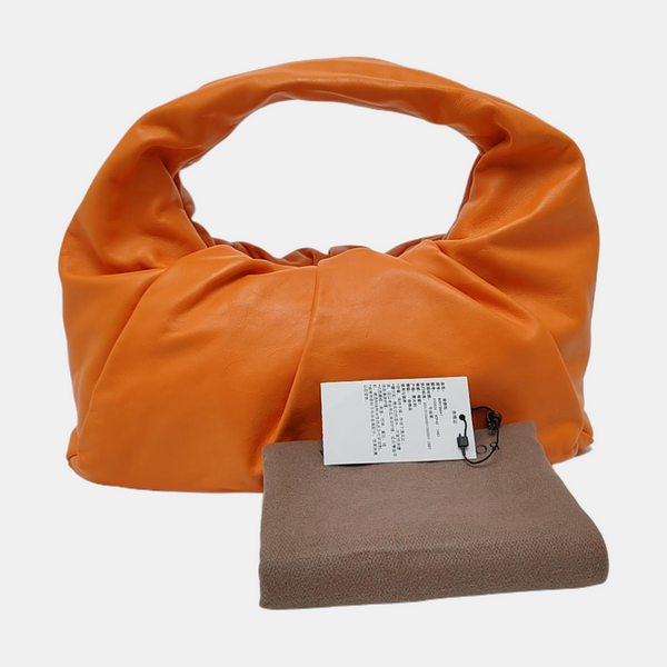 Authenticated pre-owned  The Pouch Calfskin Orange - Top Handle Bag at Looply