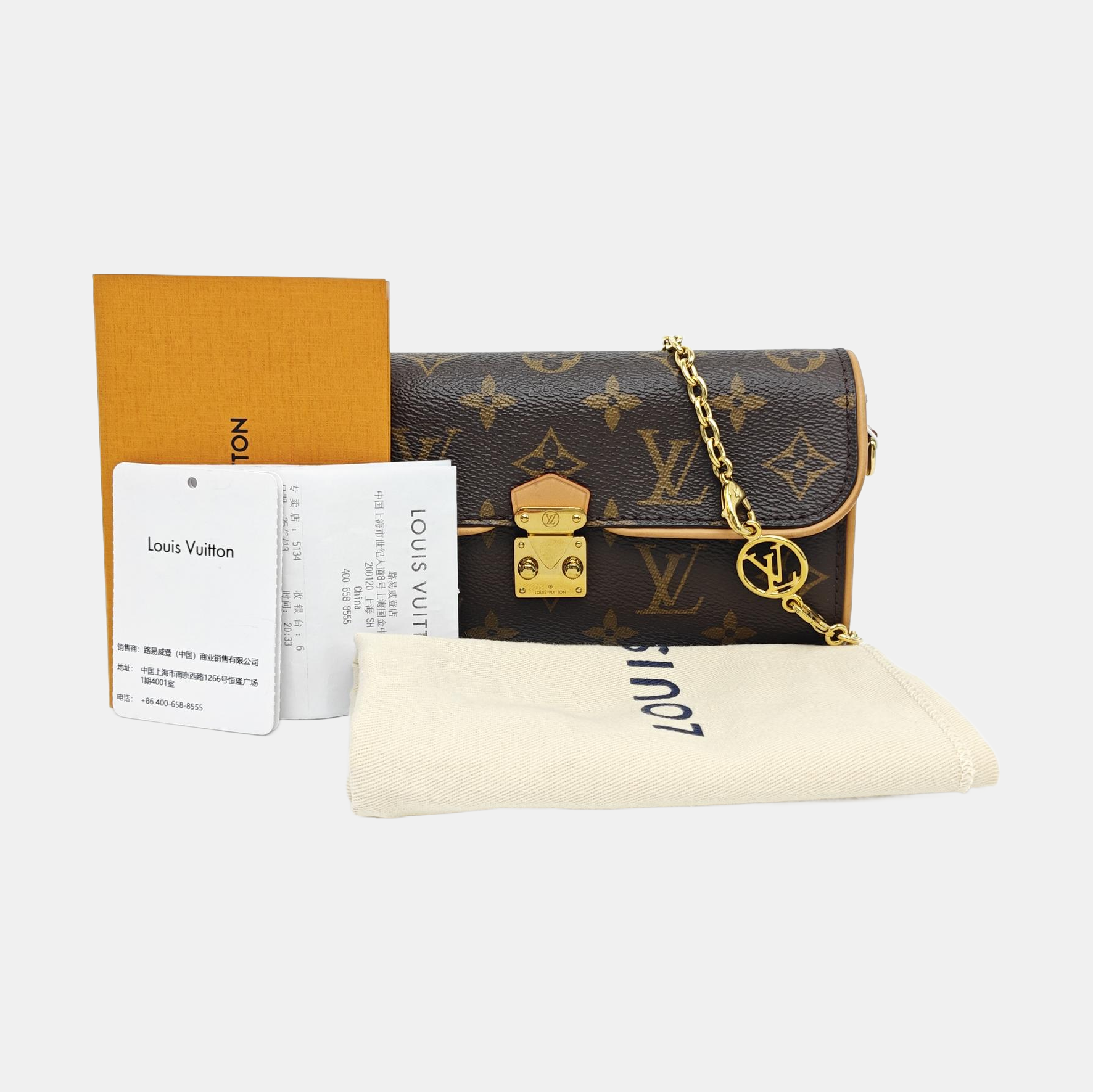 Pochette Camille Monogram Coated Canvas Brown