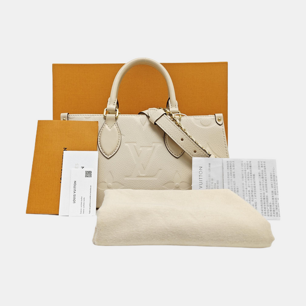 ONTHEGO EAST WEST PM Monogram Calfskin White