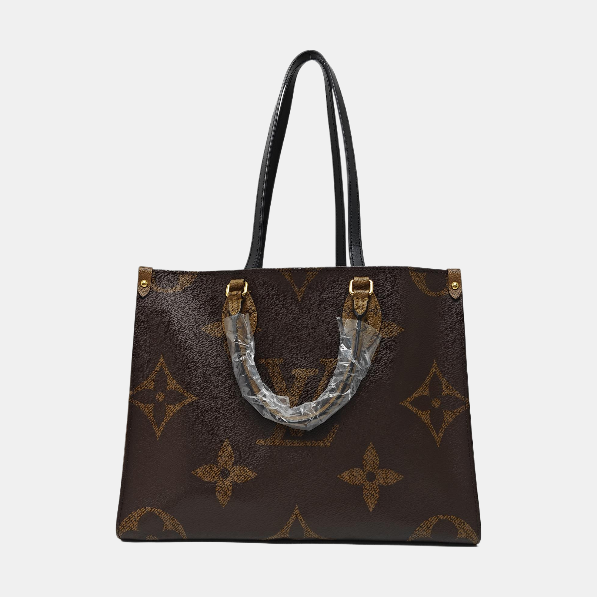 ONTHEGO MM Monogram Coated Canvas Brown