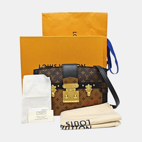 TRUNK Monogram Coated Canvas Brown