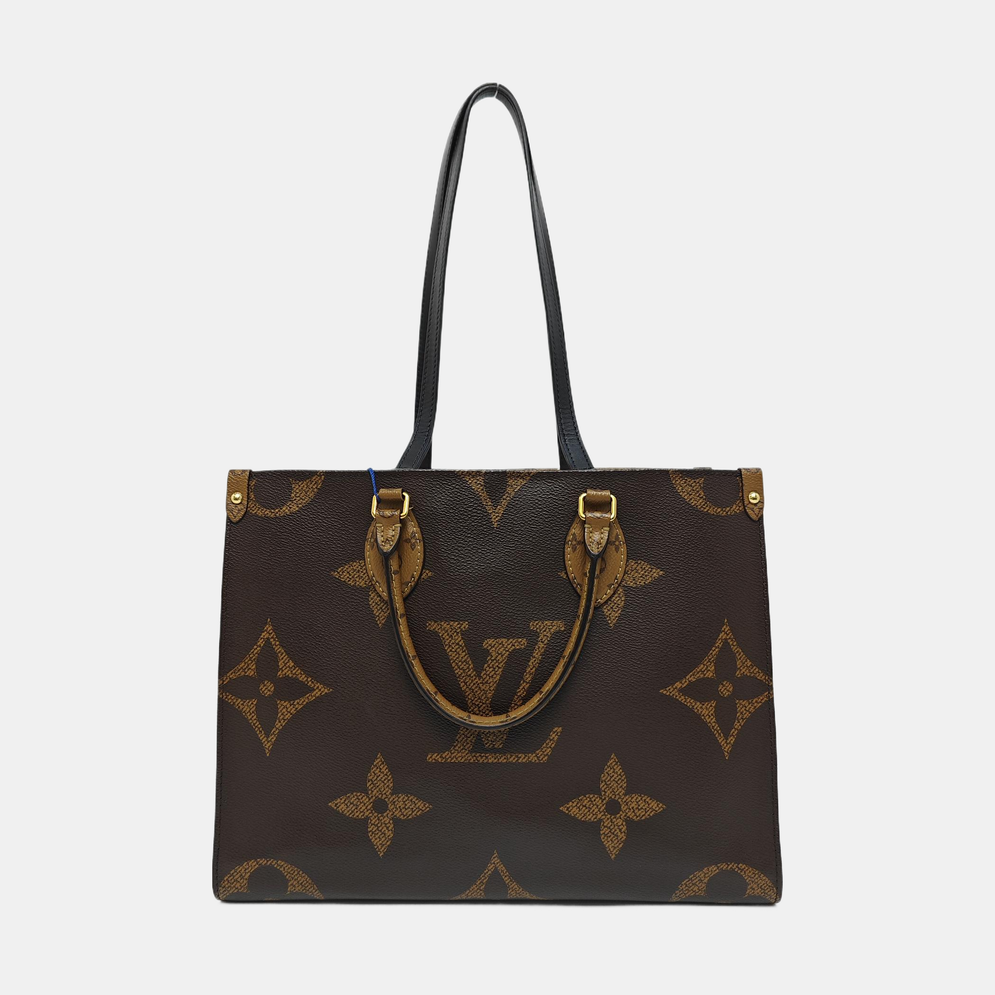 ONTHEGO MM Monogram Coated Canvas Brown