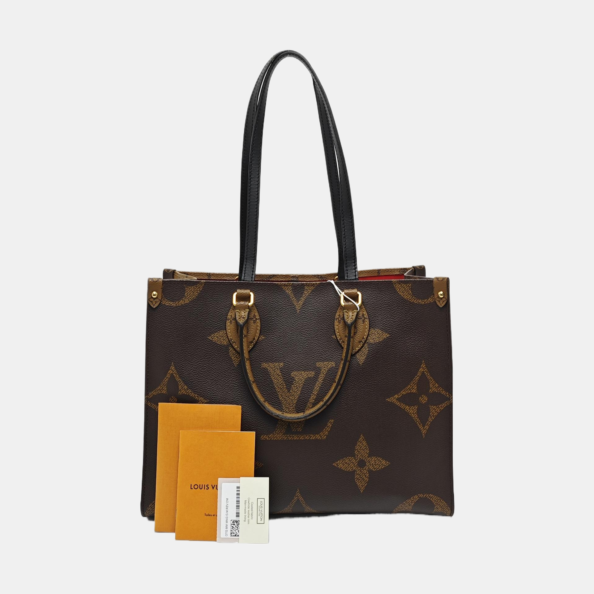 ONTHEGO MM Monogram Coated Canvas Brown