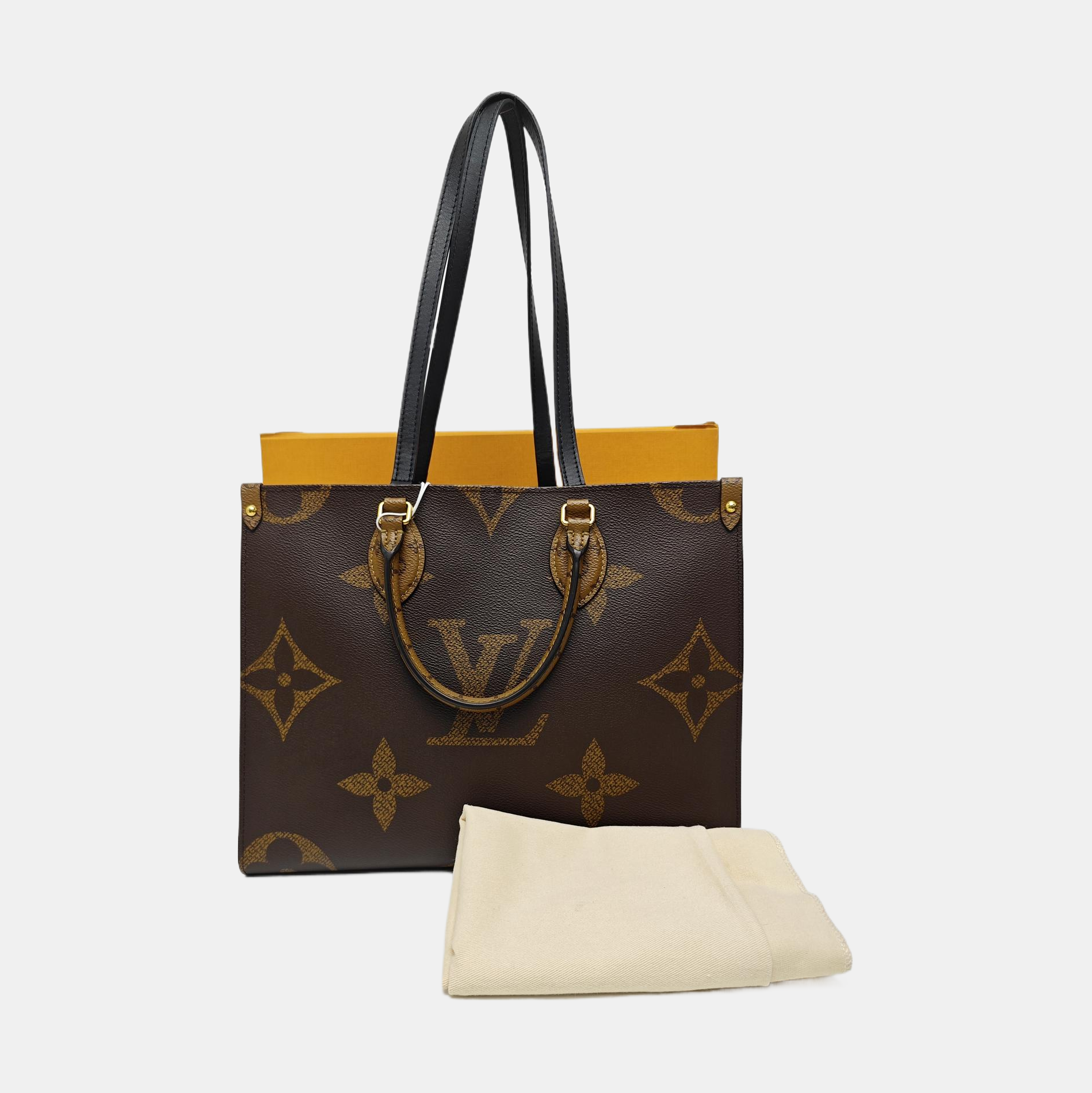 ONTHEGO MM Monogram Coated Canvas Brown