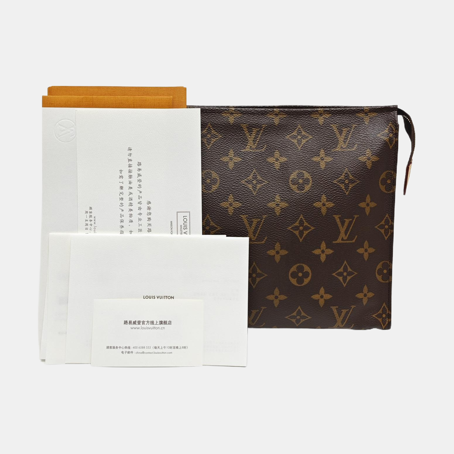 TOILET POCKET 26 Monogram Coated Canvas Brown