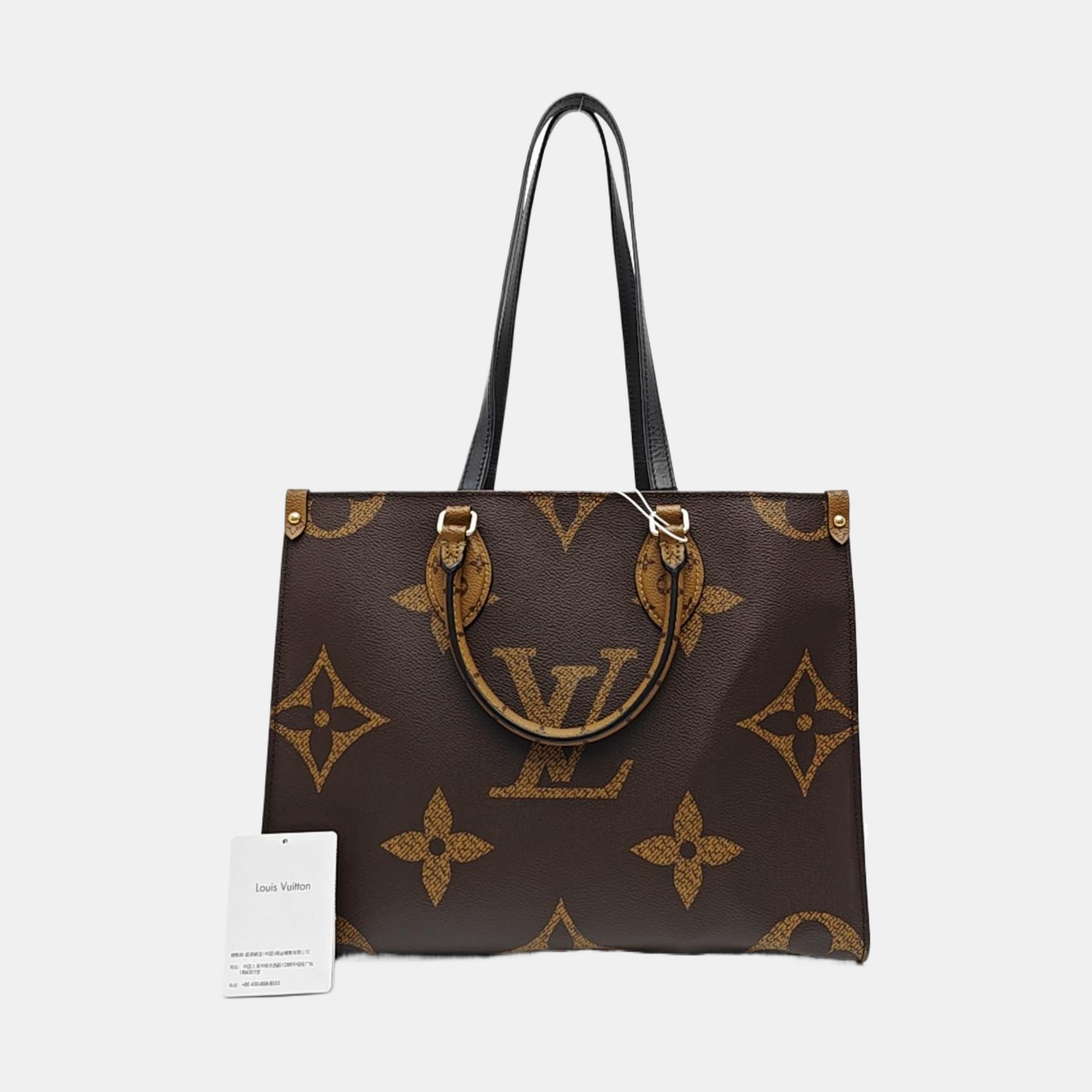 ONTHEGO MM Monogram Coated Canvas Brown