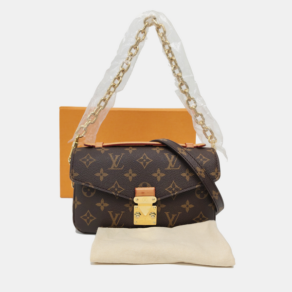 MÉTIS EAST WEST Monogram Coated Canvas Brown