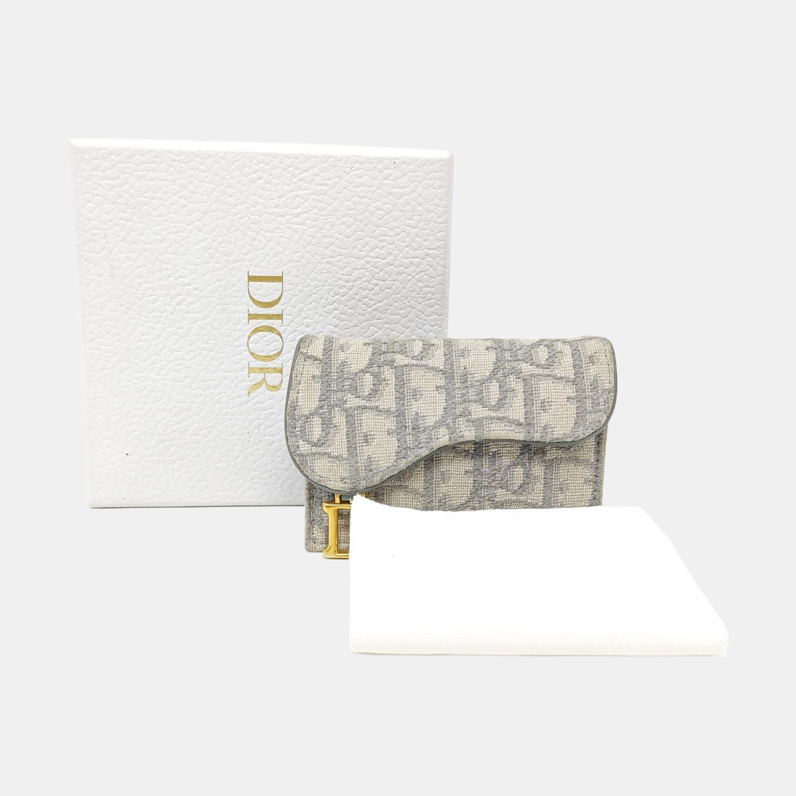 Authenticated pre-owned  Saddle Oblique Fabric Gray Card Holder - Card Holder at Looply