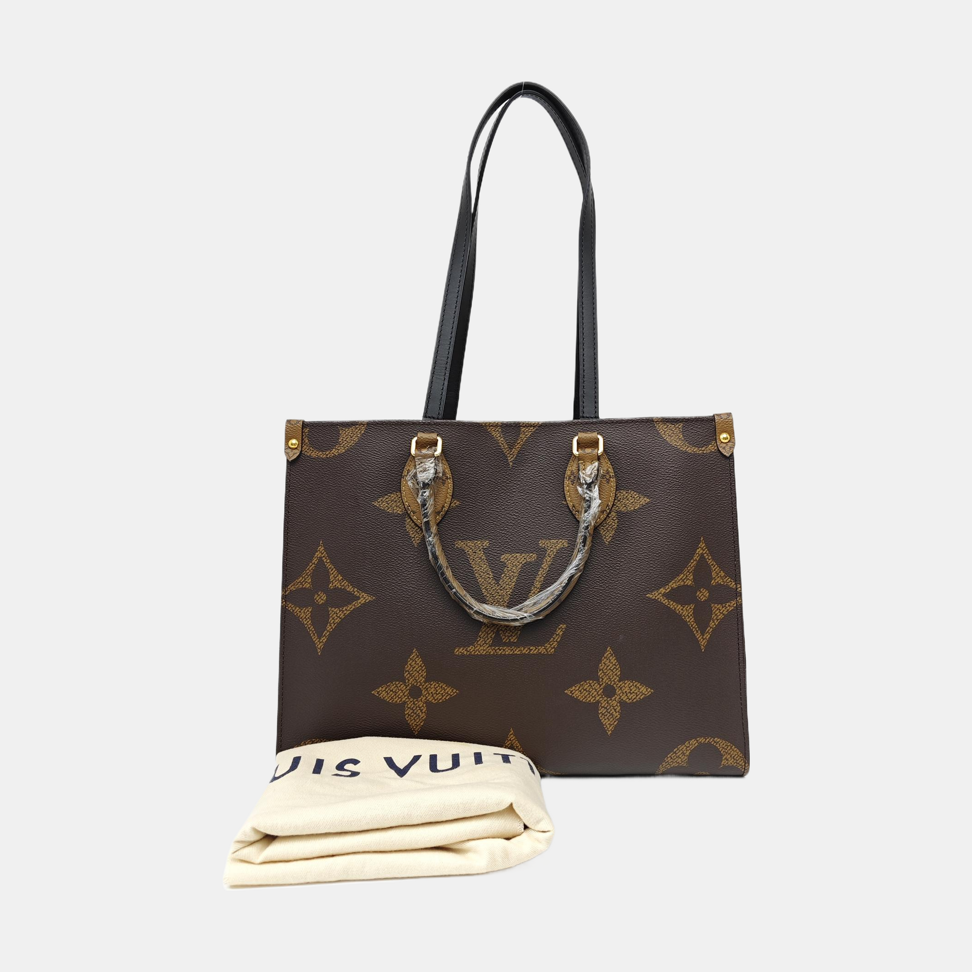 ONTHEGO MM Monogram Coated Canvas Brown
