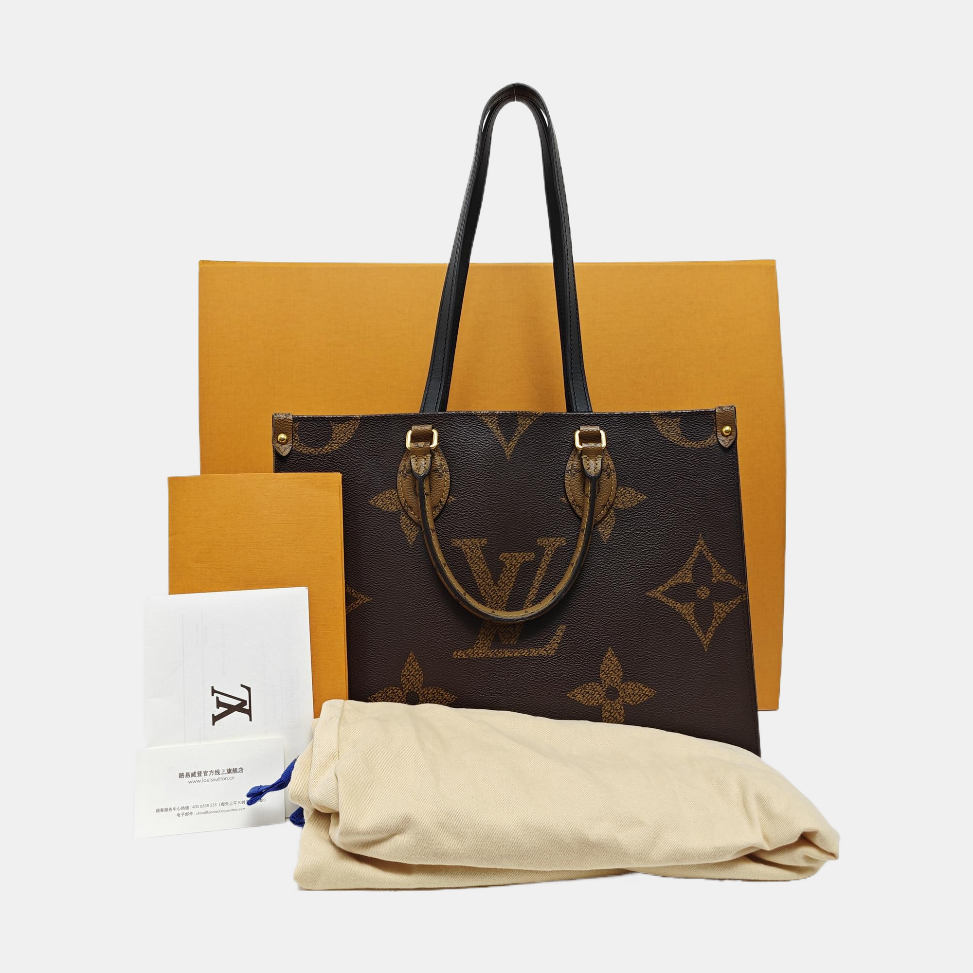 ONTHEGO MM Monogram Coated Canvas Brown