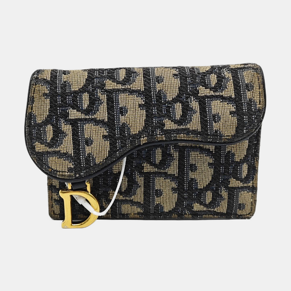 Authenticated pre-owned  Saddle Monogram Canvas Blue Card Holder - Card Holder at Looply