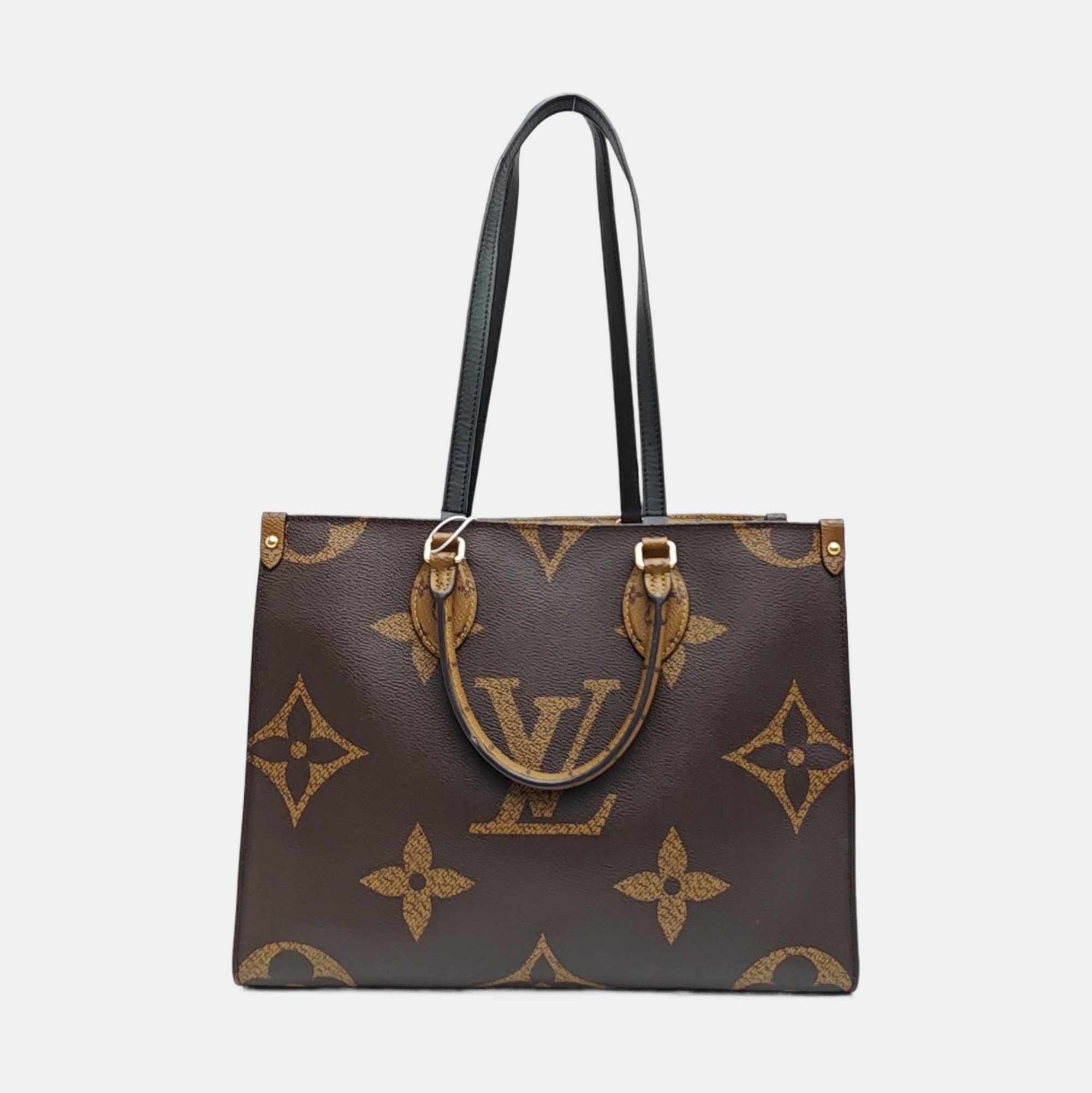 ONTHEGO MM Monogram Coated Canvas Brown