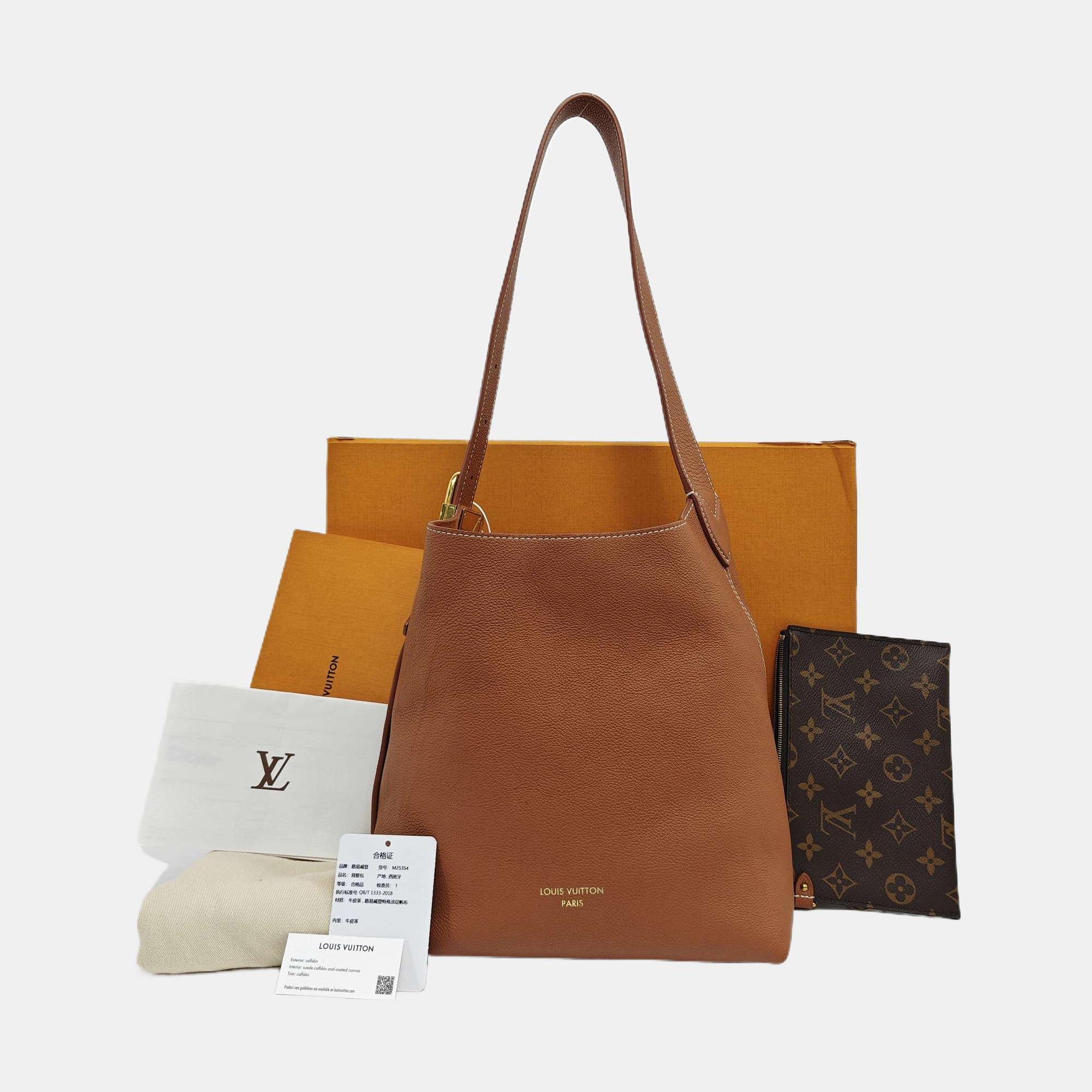 LOW KEY HOBO PM Monogram Calfskin Brown